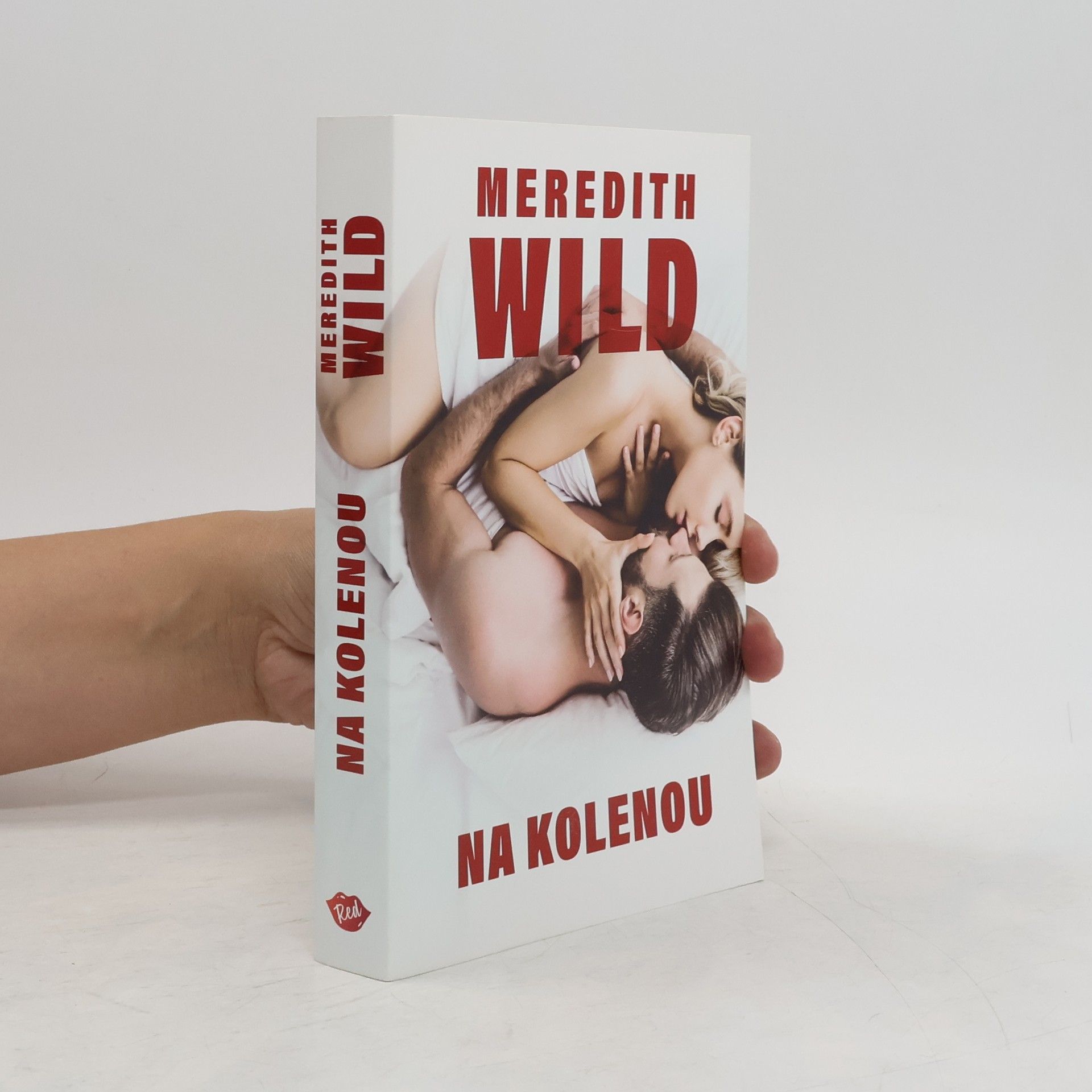 Meredith Wild Na kolenou