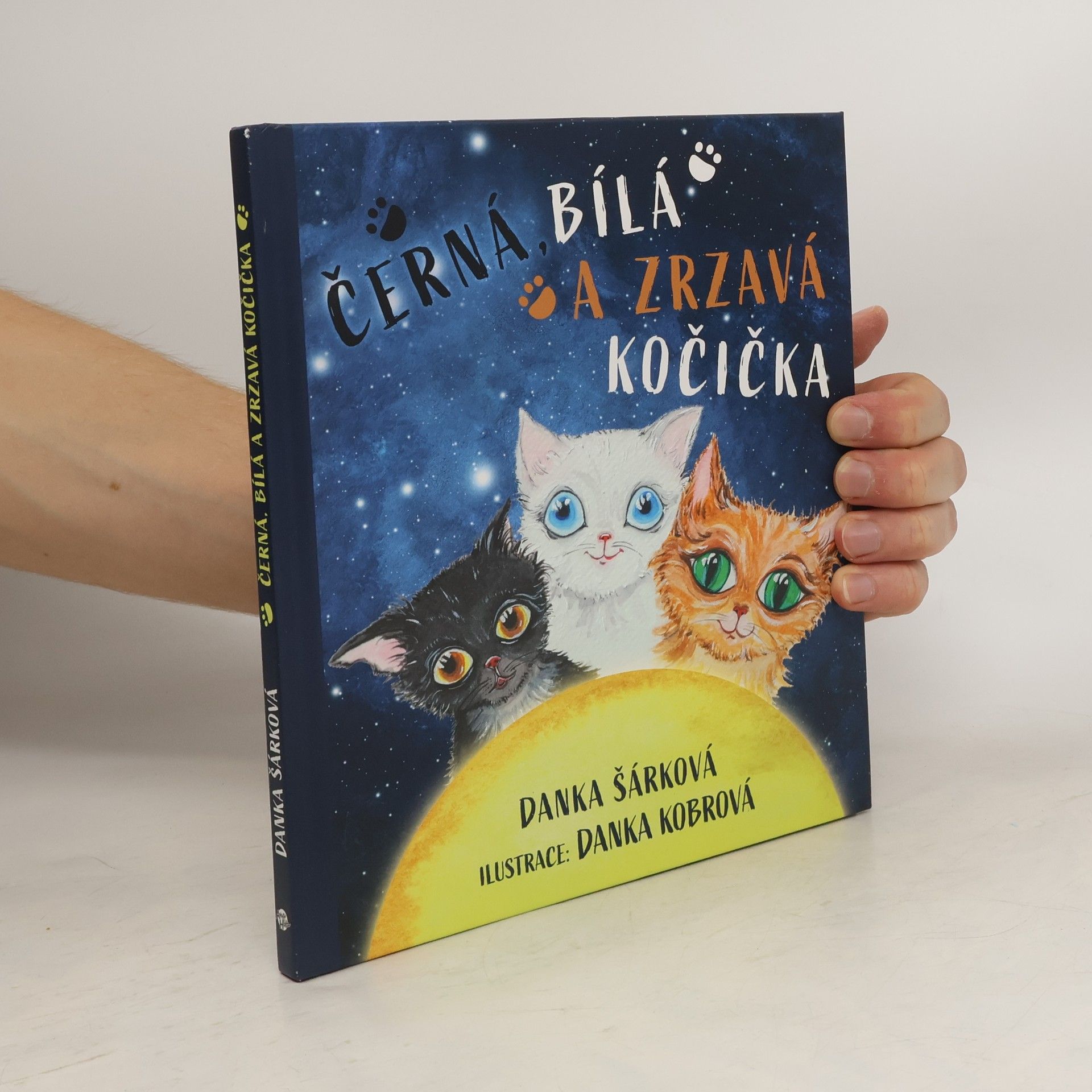 Danka Šárková Černá, bílá a zrzavá kočička
