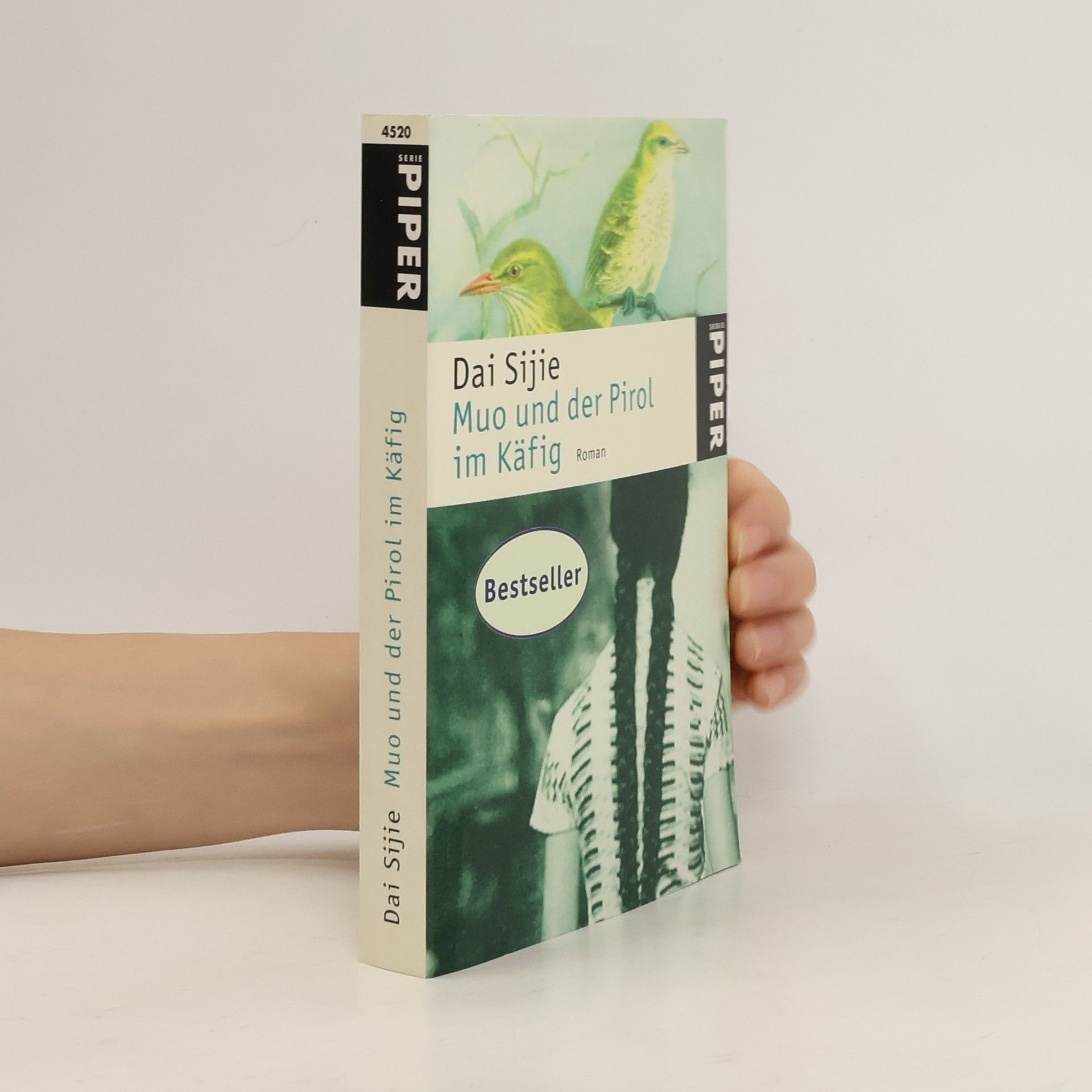 Sijie Dai Muo und der Pirol im Käfig