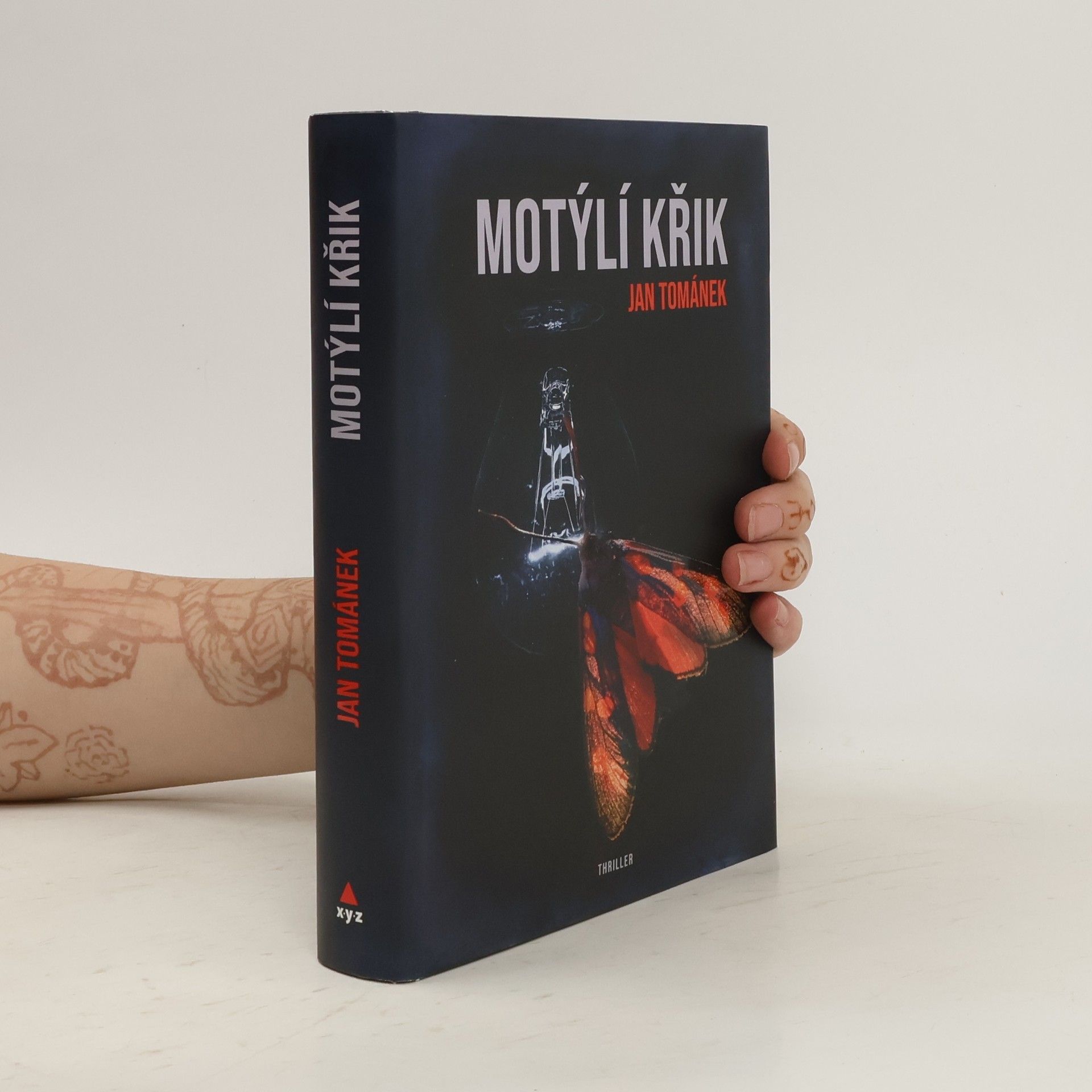 Jan Tománek Motýlí křik