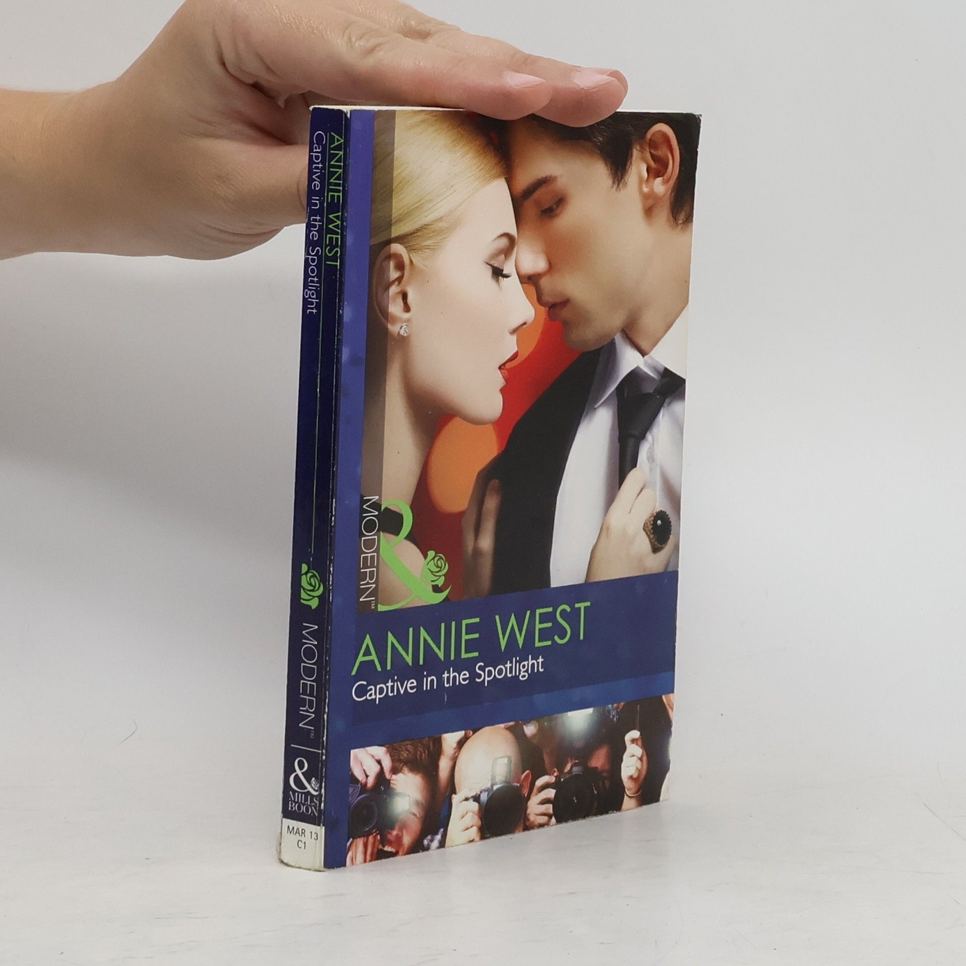 Annie West Captive in the Spotlight