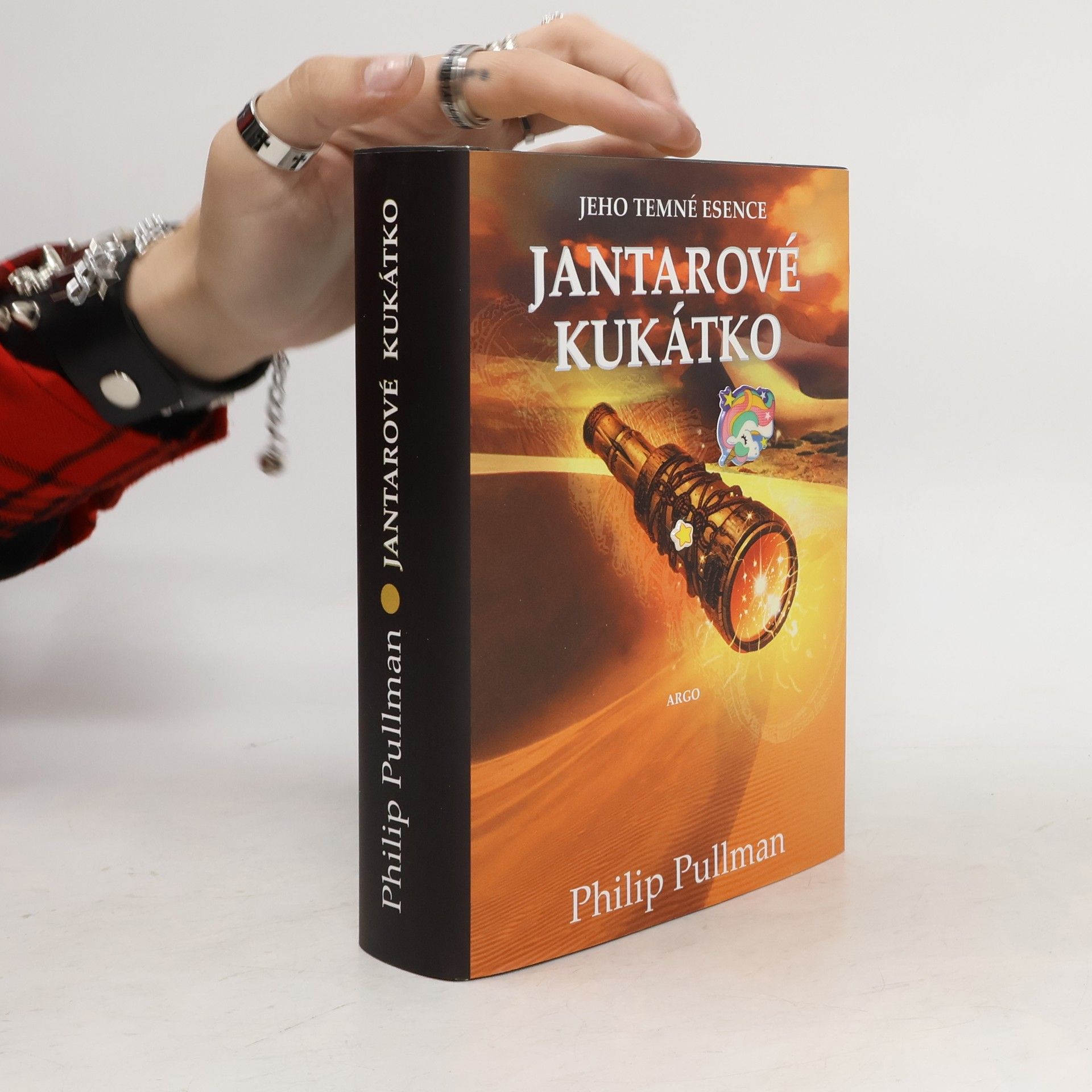 Philip Pullman Jantarové kukátko