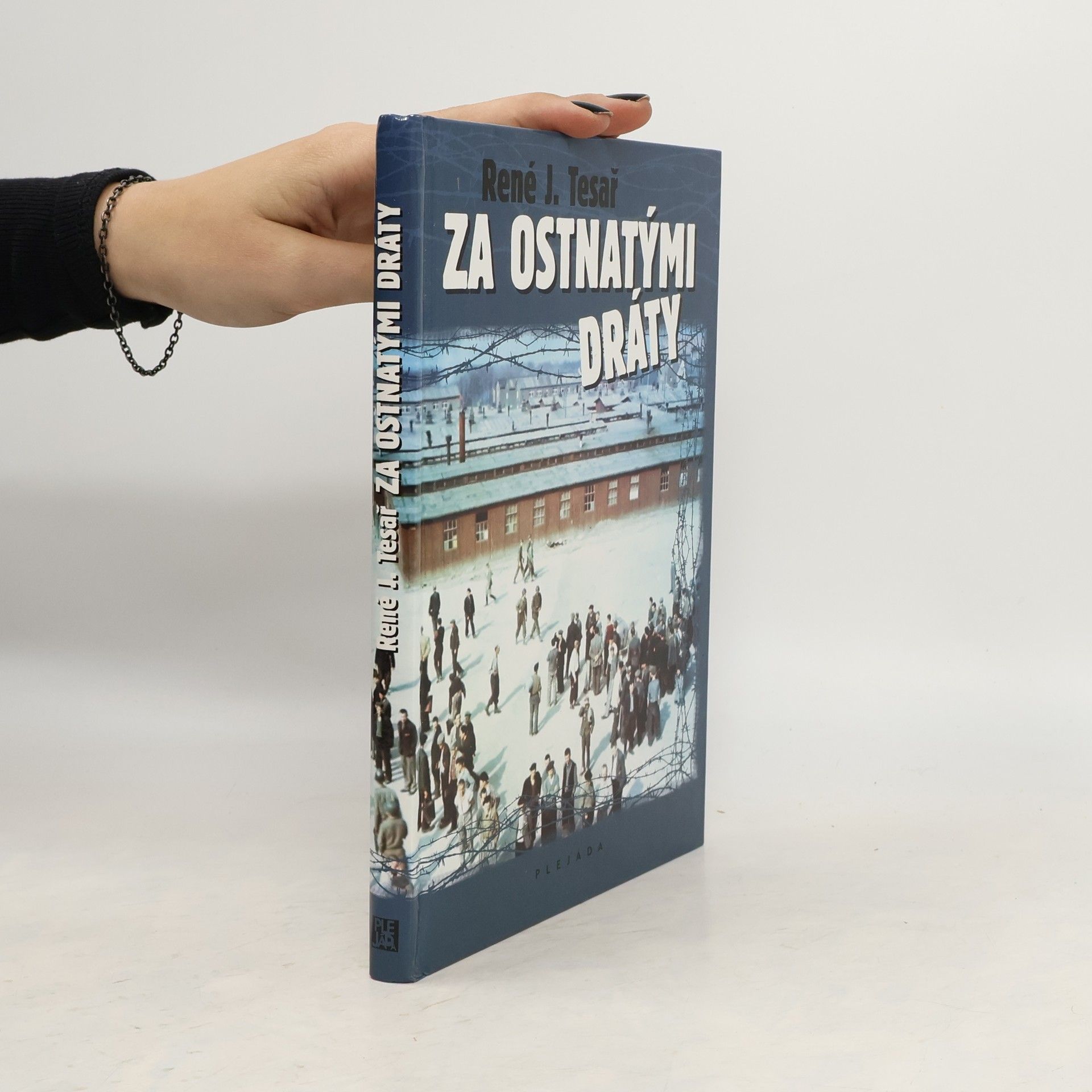 René J. Tesař Za ostnatými dráty