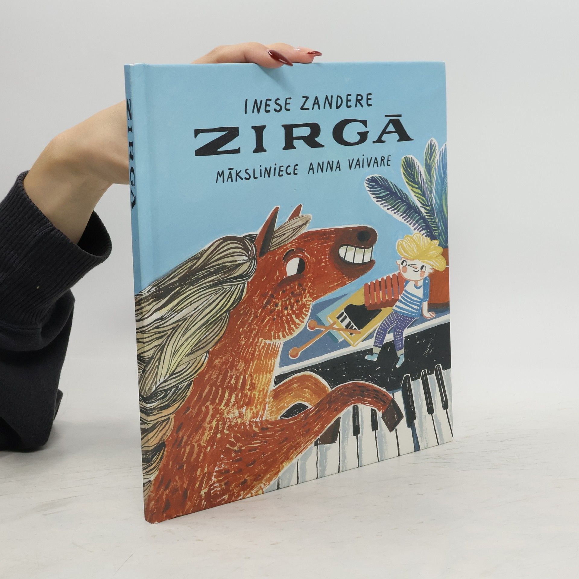 Inese Zandere Zirgā