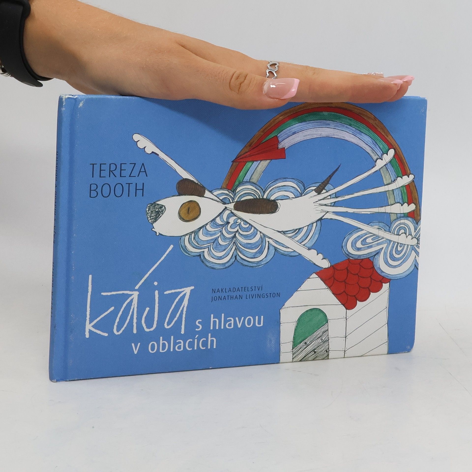 Tereza Booth Kája s hlavou v oblacích
