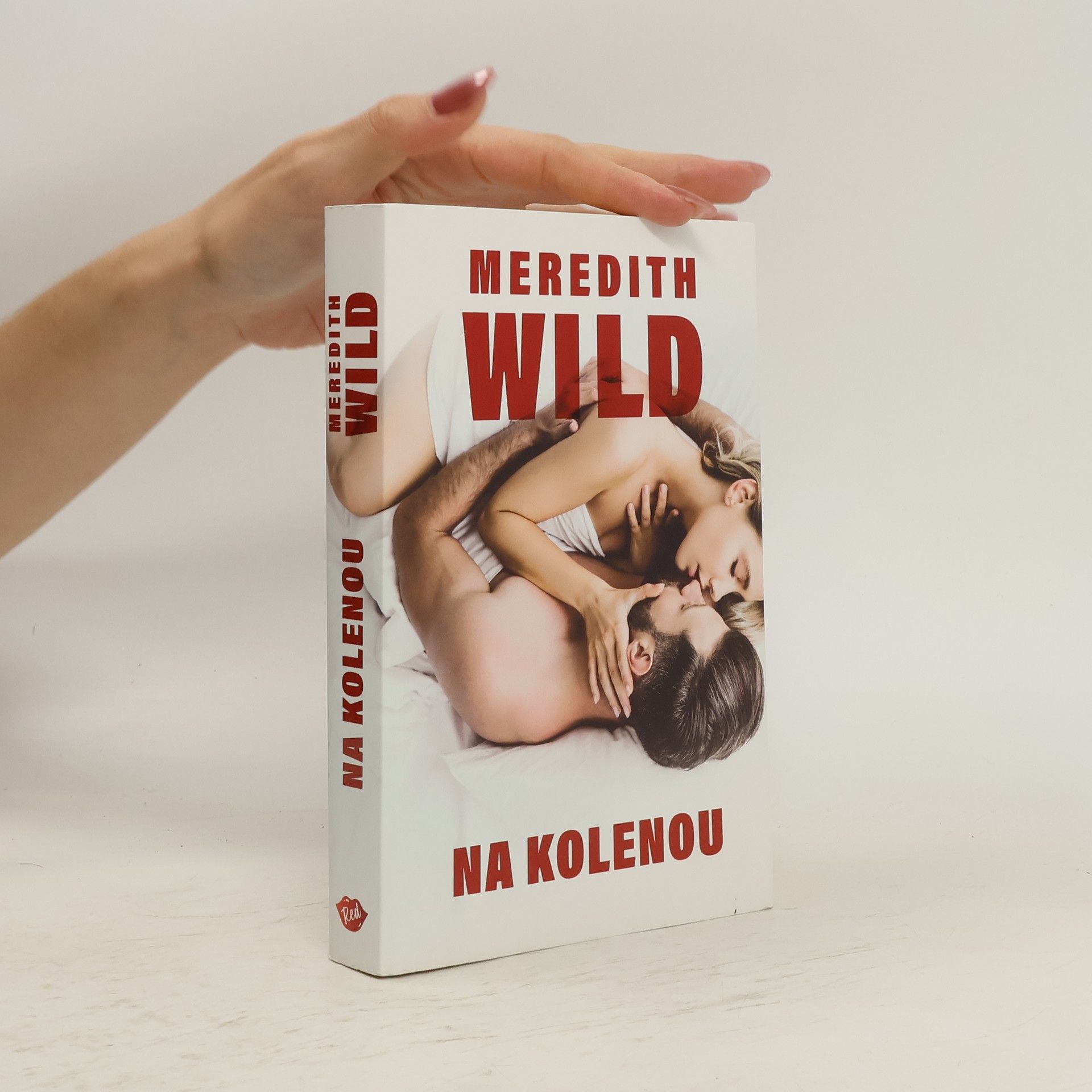 Meredith Wild Na kolenou