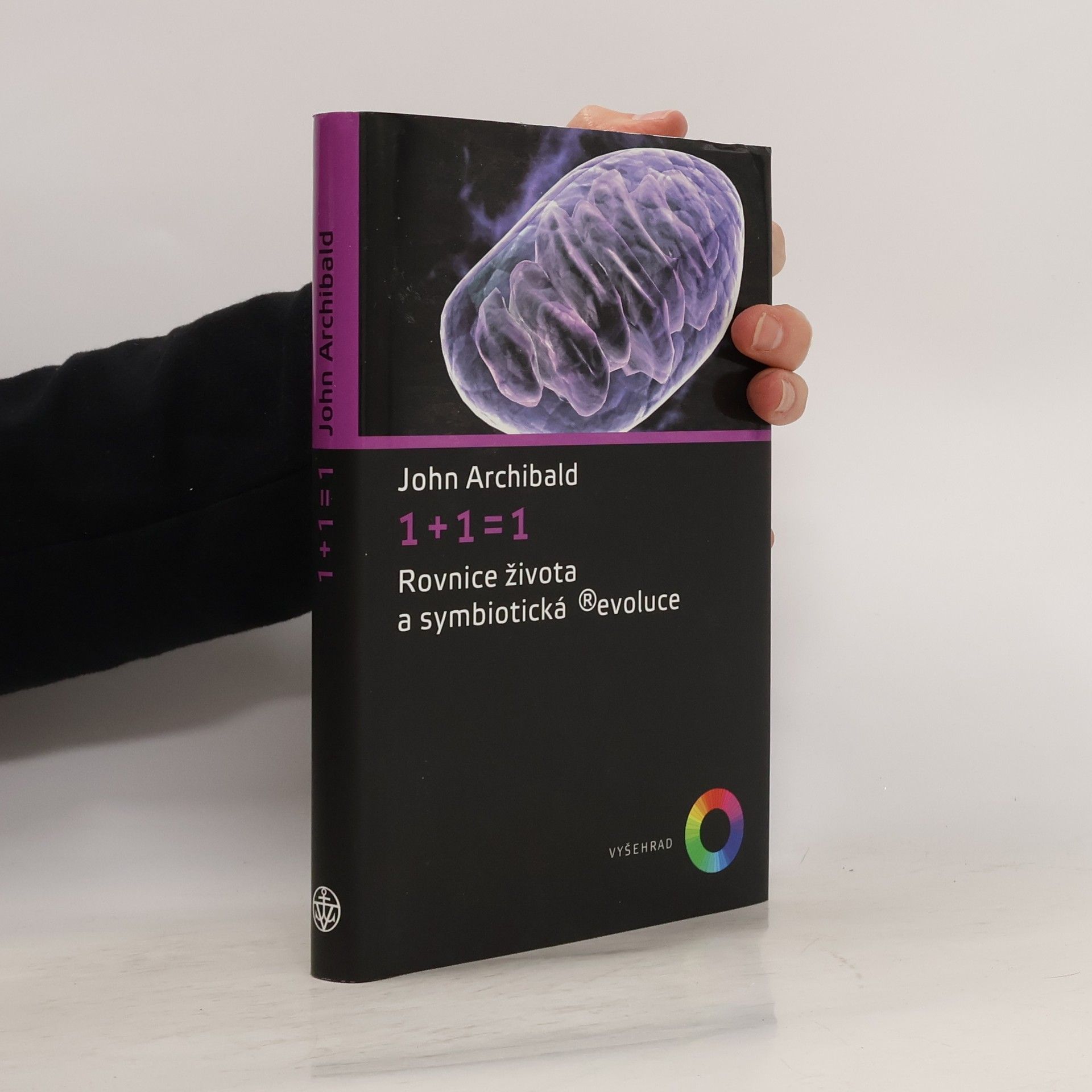 John Archibald 1 + 1 = 1 : rovnice života a symbiotická ®evoluce