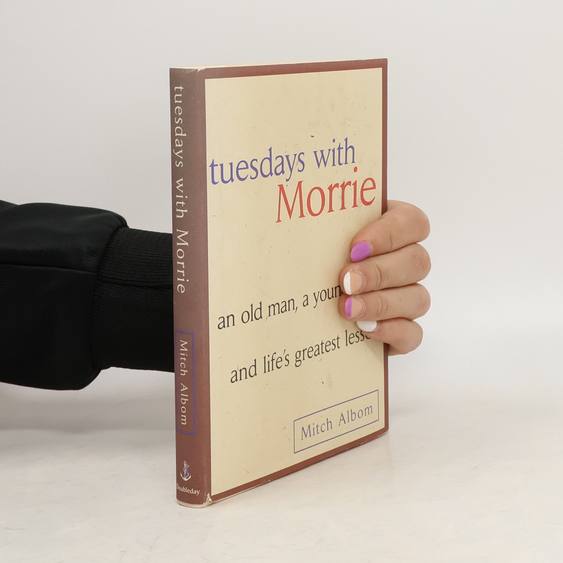 Mitch Albom Tuesdays with Morrie. An old man, a young man, and life's greatest lesson