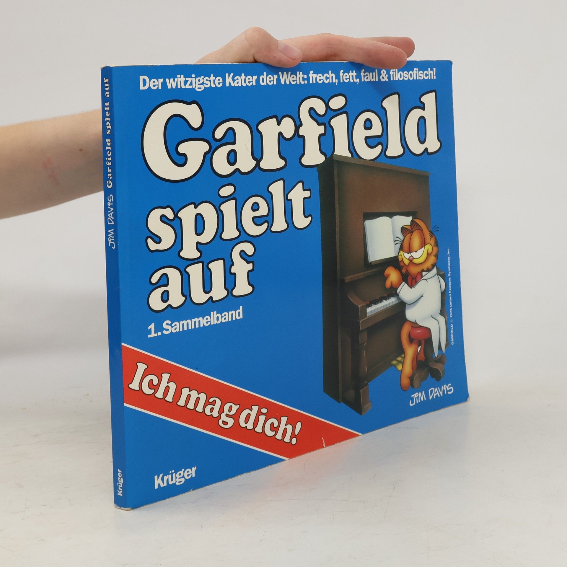 Jim Davis Garfield spielt auf
