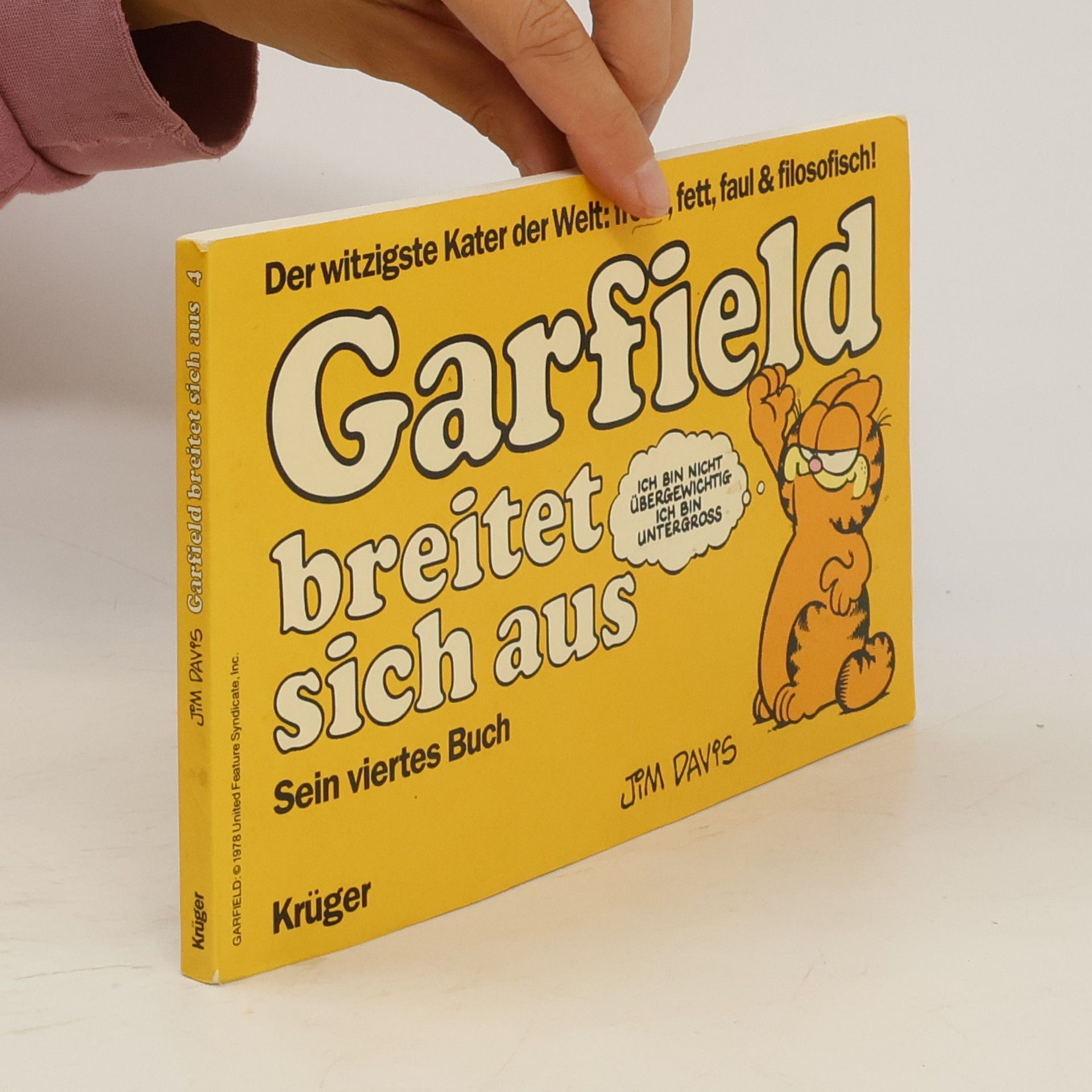 Jim Davis Garfield brietet sich aus