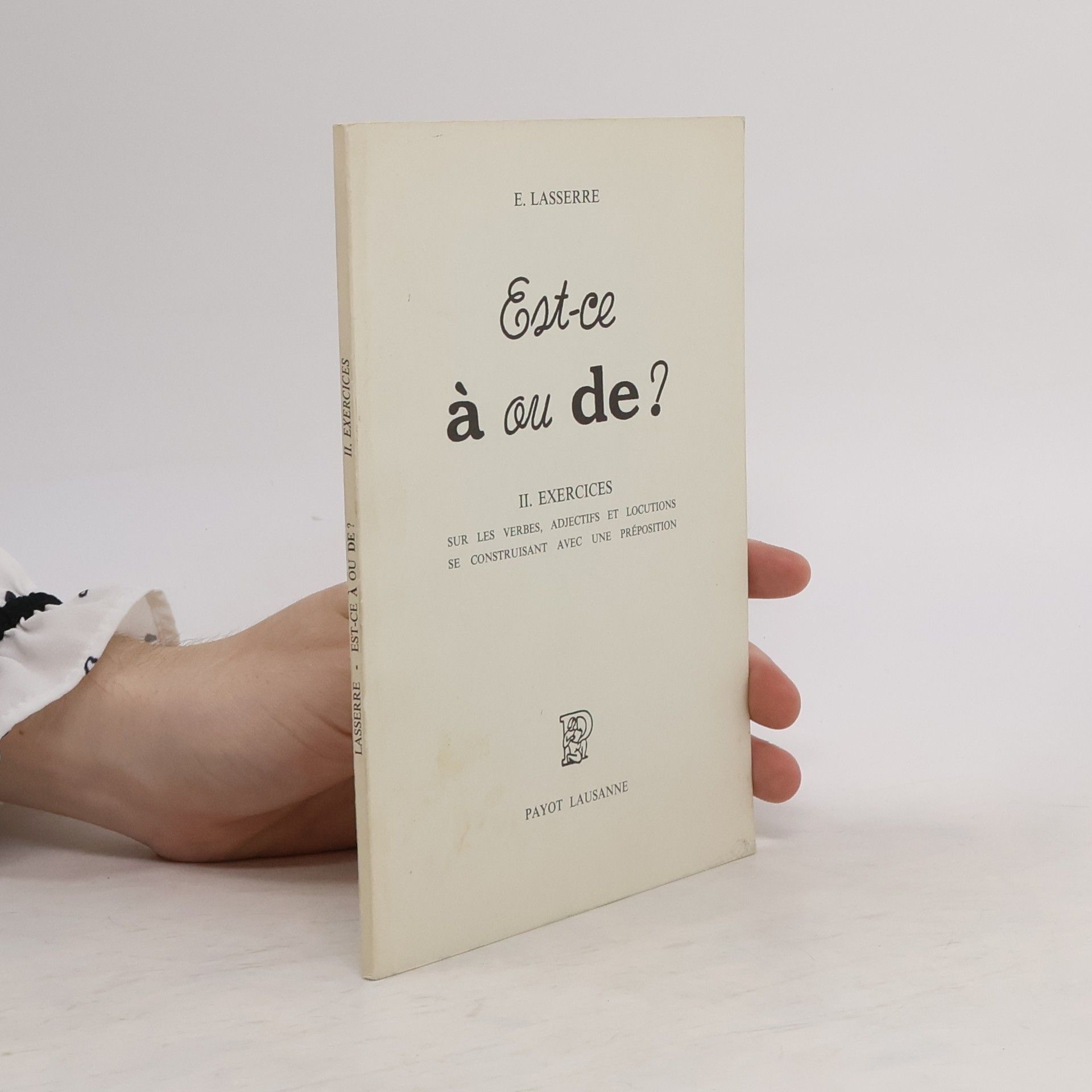 E. Lasserre Est-ce à ou de?