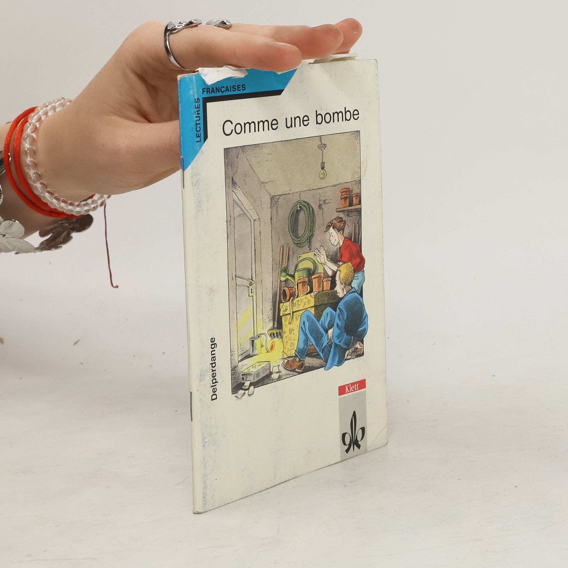 Delperdange Comme une bombe. Text in Französisch