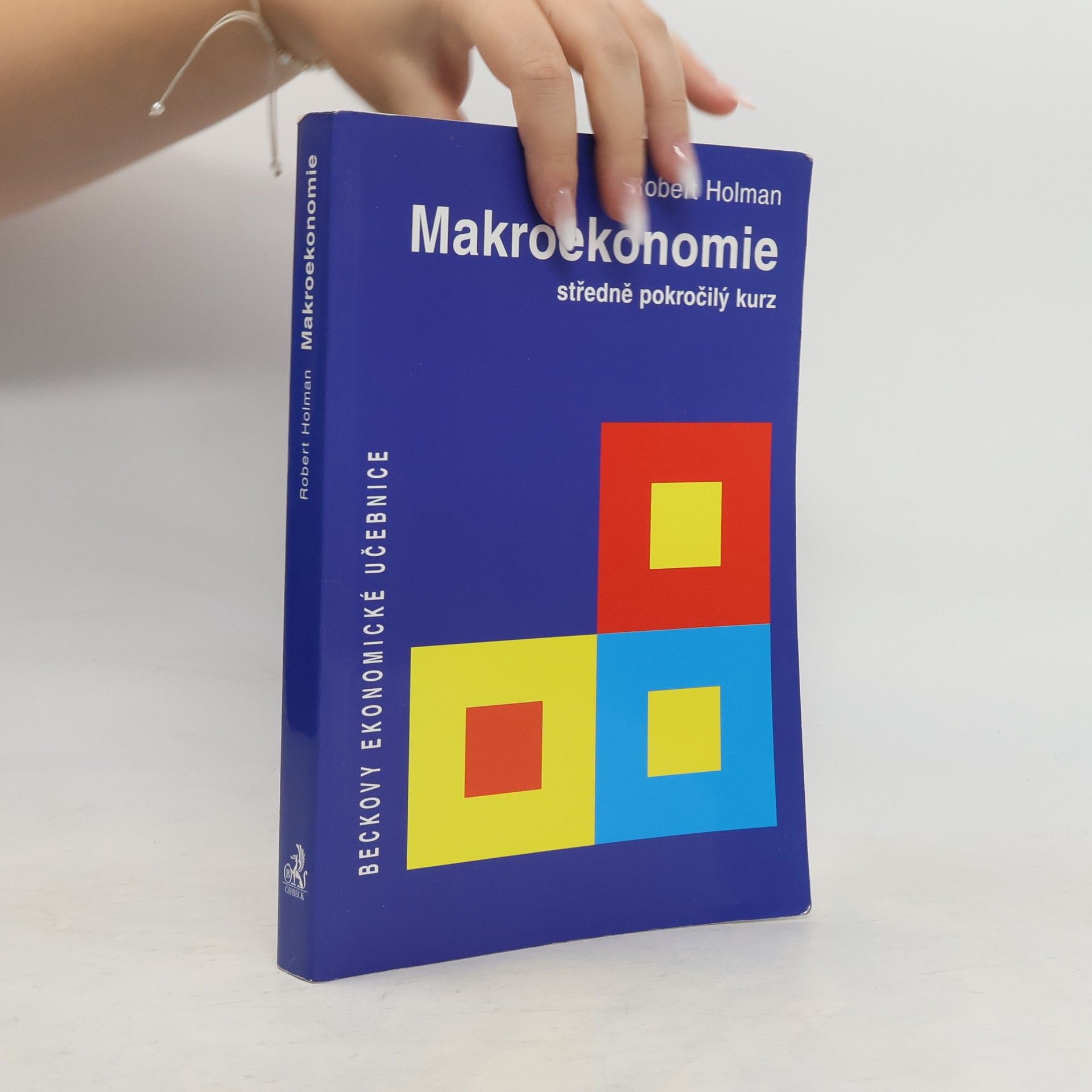 Robert Holman Makroekonomie. Středně pokročilý kurz