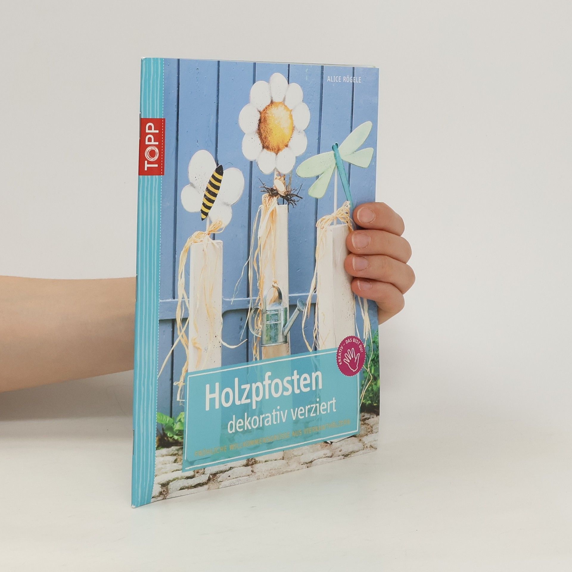 Alice Rögele Holzpfosten dekorativ verziert