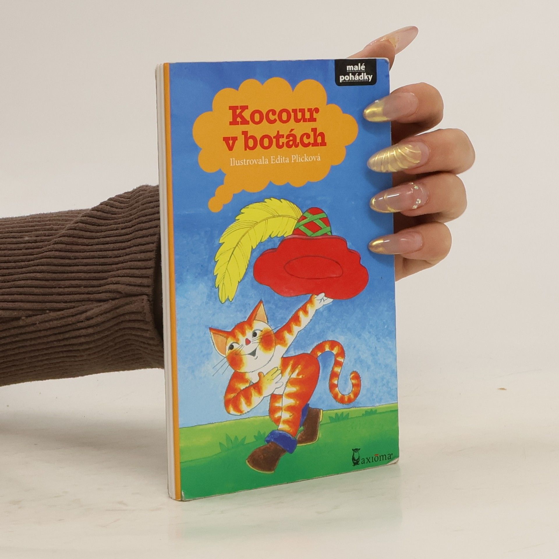 Edita Plicková Kocour v botách