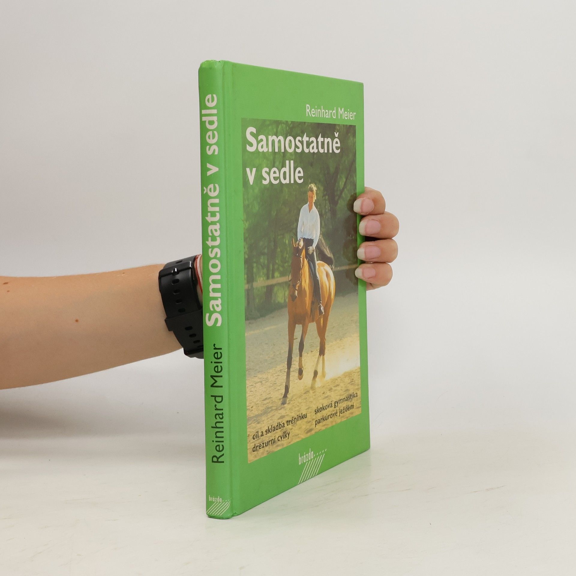 Reinhard Meier Samostatně v sedle : cíl a skladba tréninku, drezurní cviky, skoková gymnastika, parkúrové ježdění