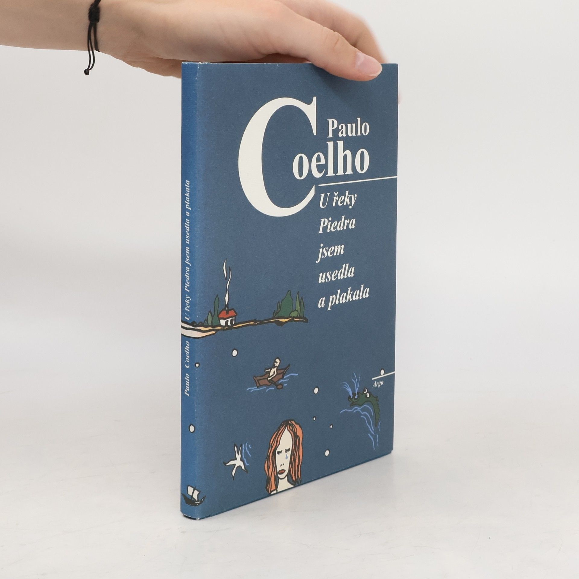 Paulo Coelho U řeky Piedra jsem usedla a plakala