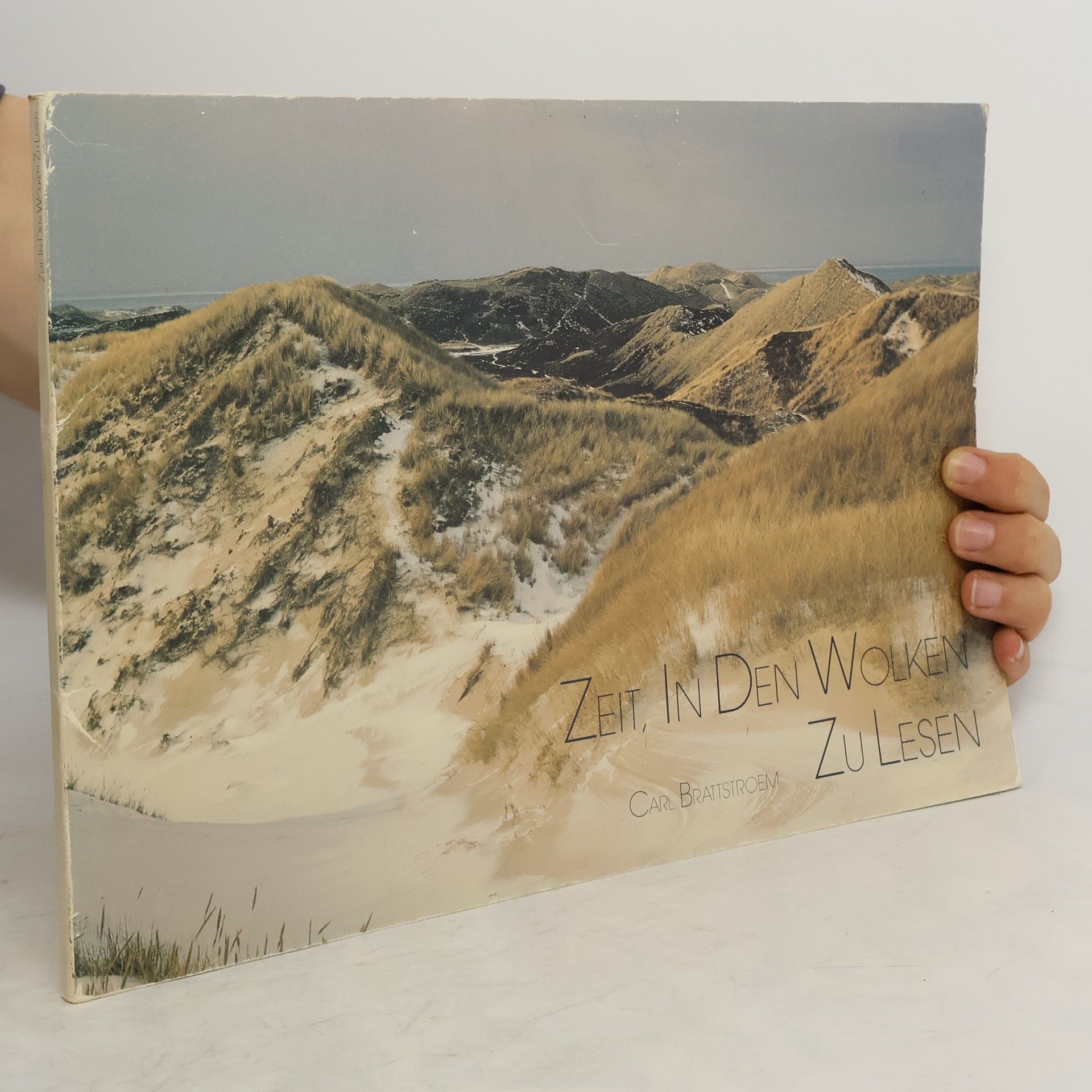 Carl Brattstroem Zeit, in den Wolken zu lesen