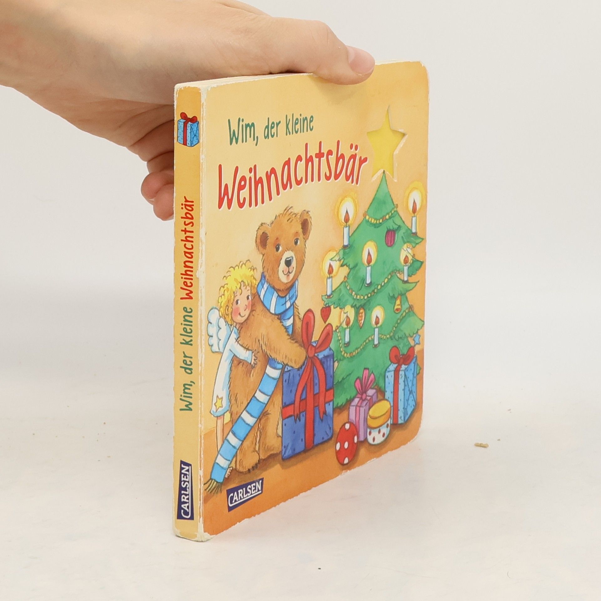Annette Moser Wim, der kleine Weihnachtsbär. Mit neugierig machenden Gucklöchern und gereimter Geschichte