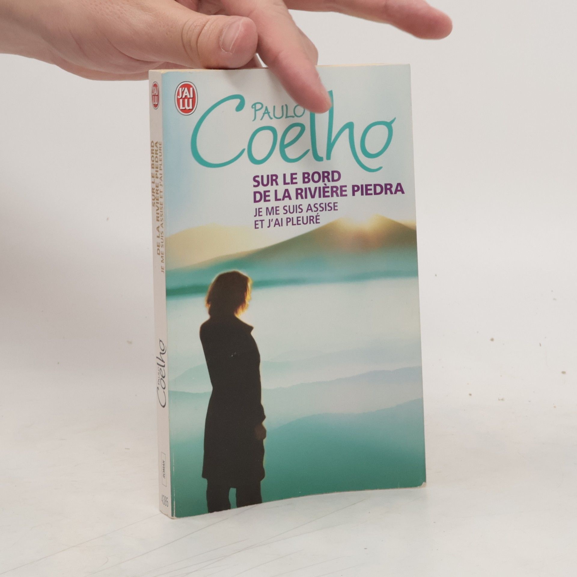 Paulo Coelho Sur le bord de la rivière Piedra, je me suis assise et j'ai pleuré