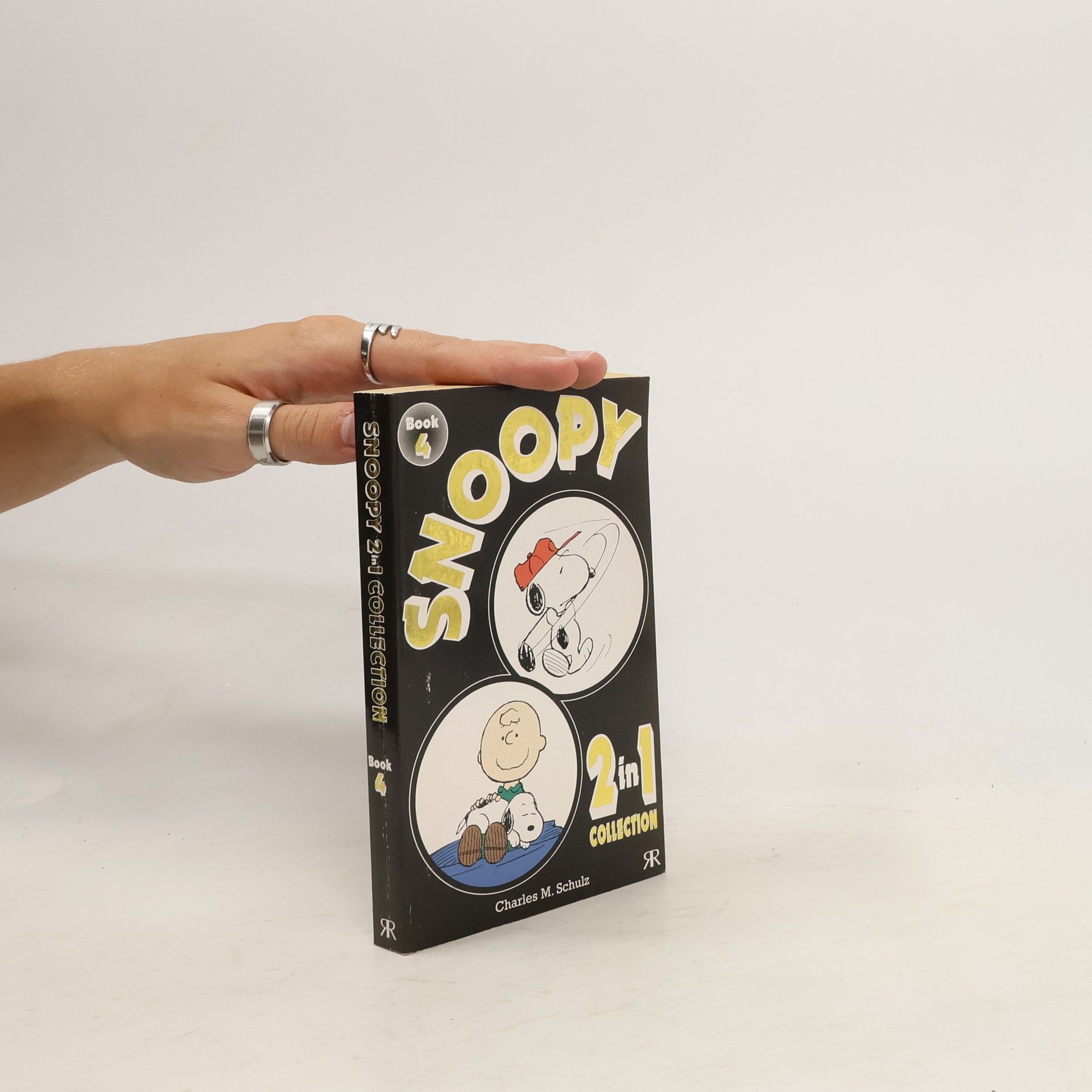 Charles M. Schulz Snoopy 2-in-1 Collection. Book.4. Snoopy features as Master of the Fairways; Snoopy features as Man's Best Friend