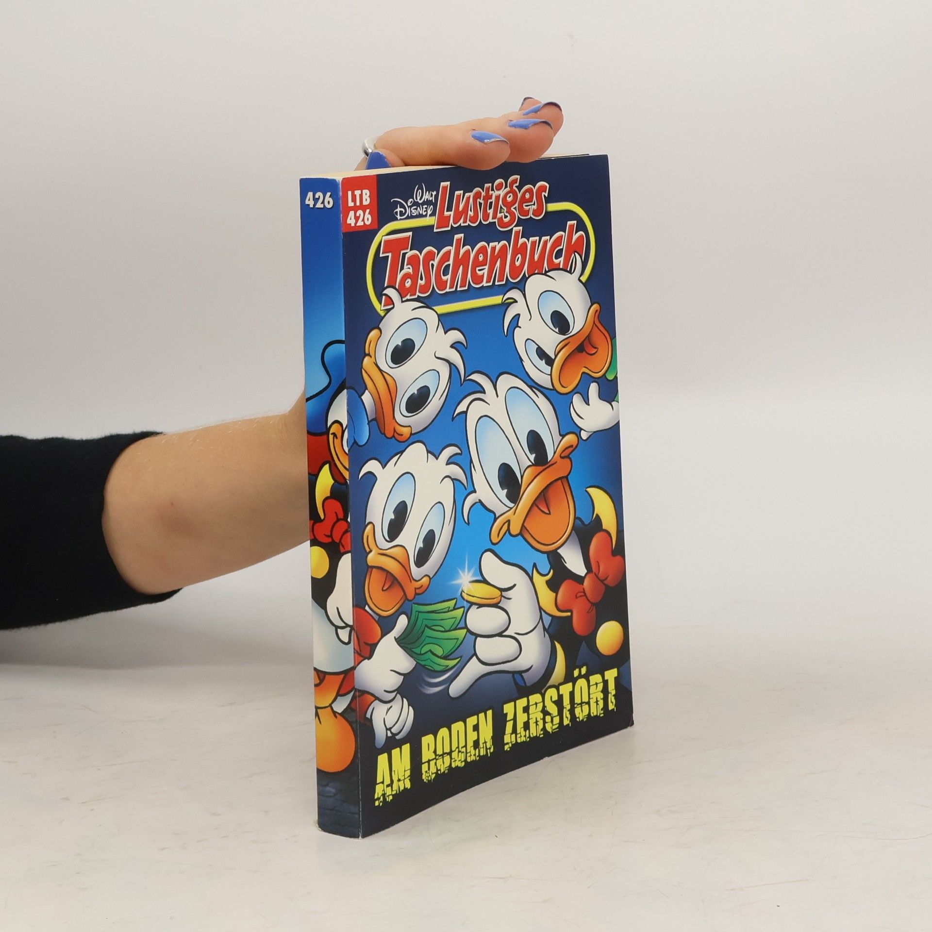 Walt Disney Lustiges Taschenbuch 426. Am Boden Zebstöbt