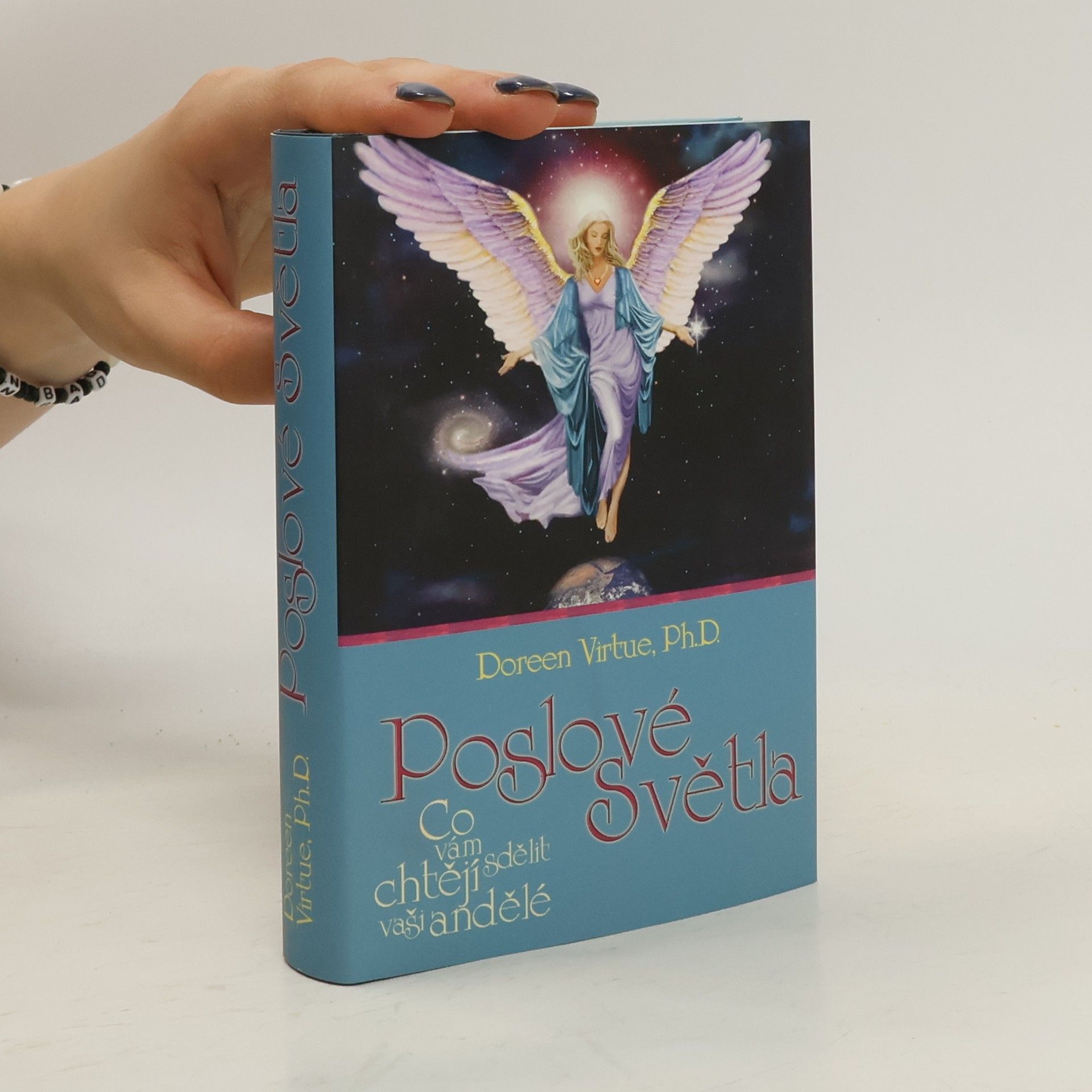 Doreen Virtue Poslové světla. Co vám chtějí sdělit vaši andělé