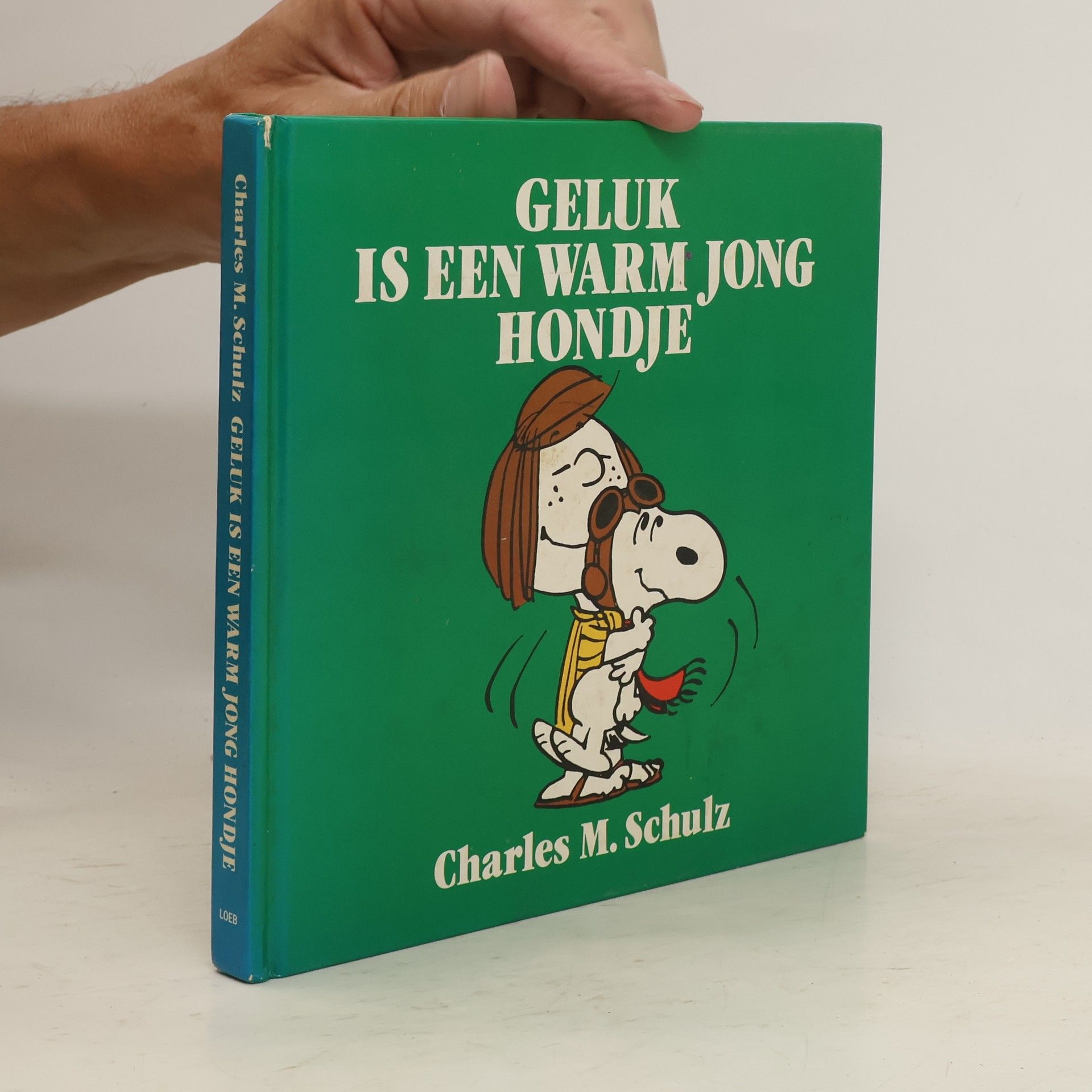 Charles M. Schulz Geluk is een warm jong hondje