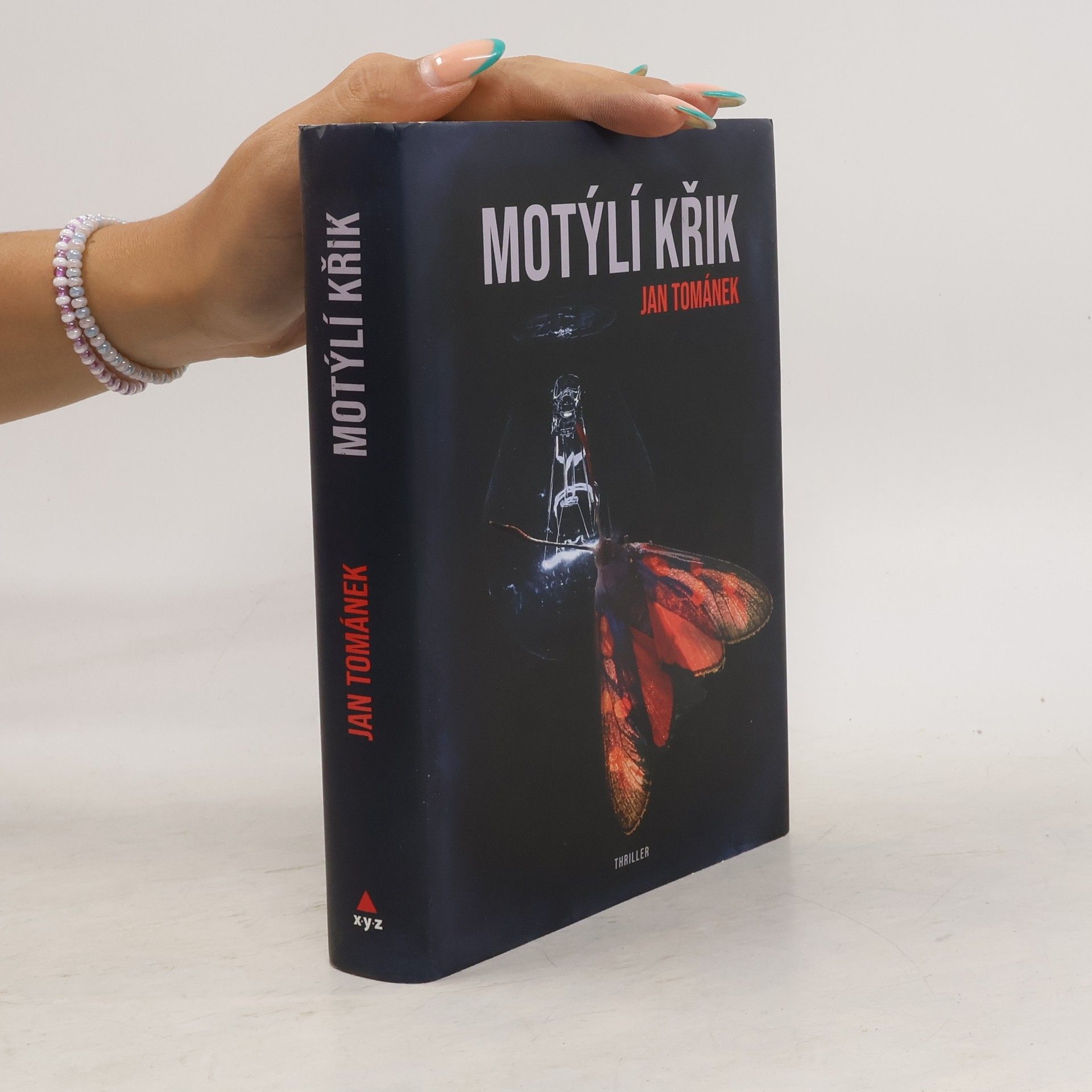 Jan Tománek Motýlí křik