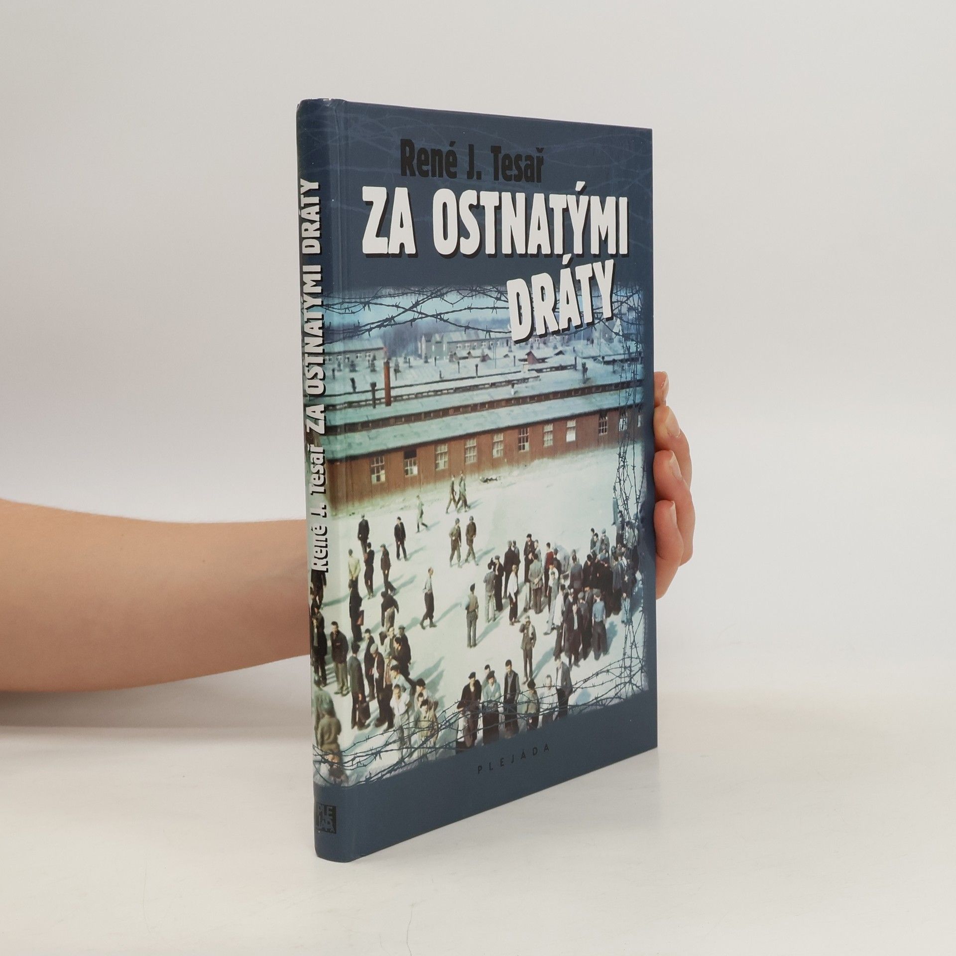 René J. Tesař Za ostnatými dráty