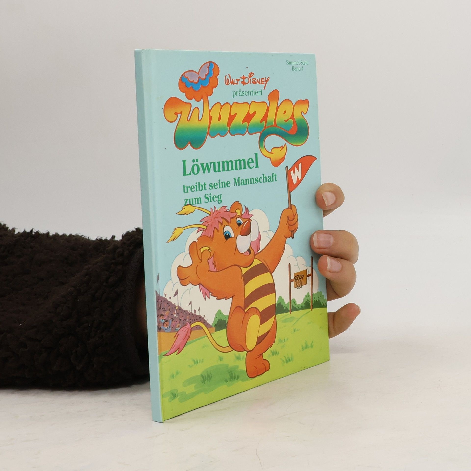 Autorenkollektiv Wuzzles. Löwummel treibt seine Mannschaft zum Sieg