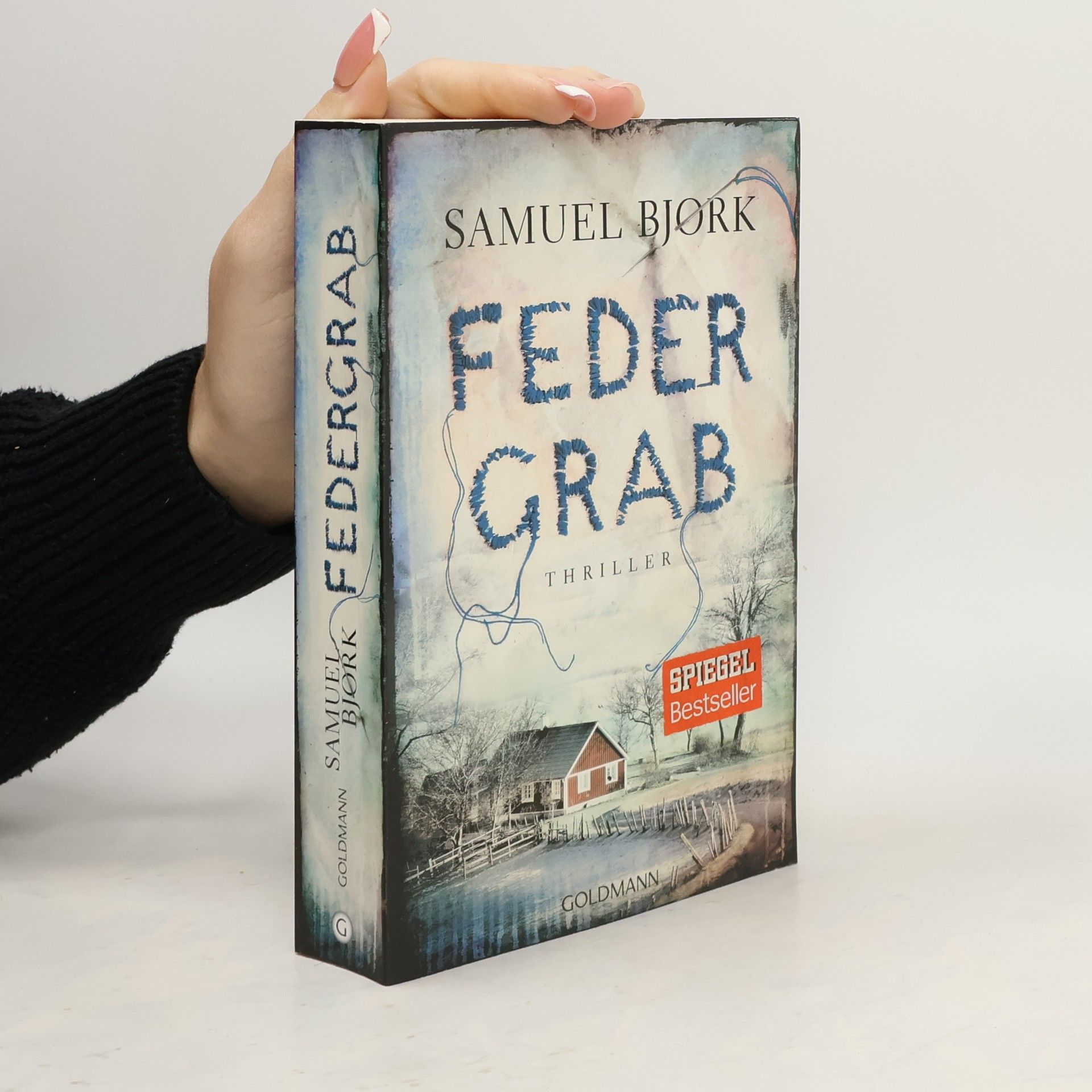 Feder Grab