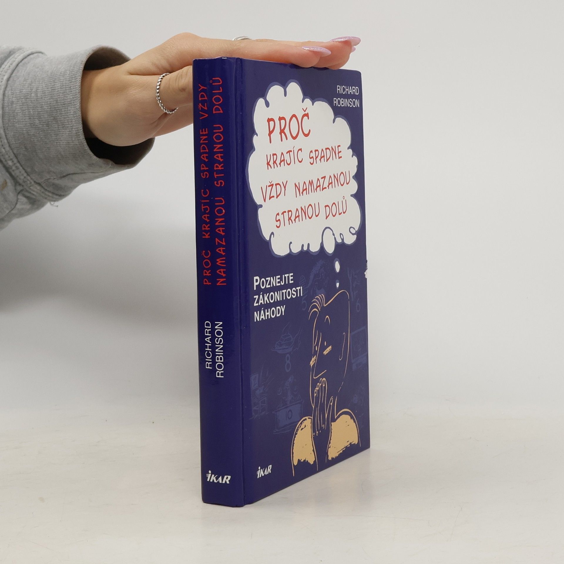 Richard Robinson Proč krajíc spadne vždy namazanou stranou dolů. Poznejte zákonitosti náhody