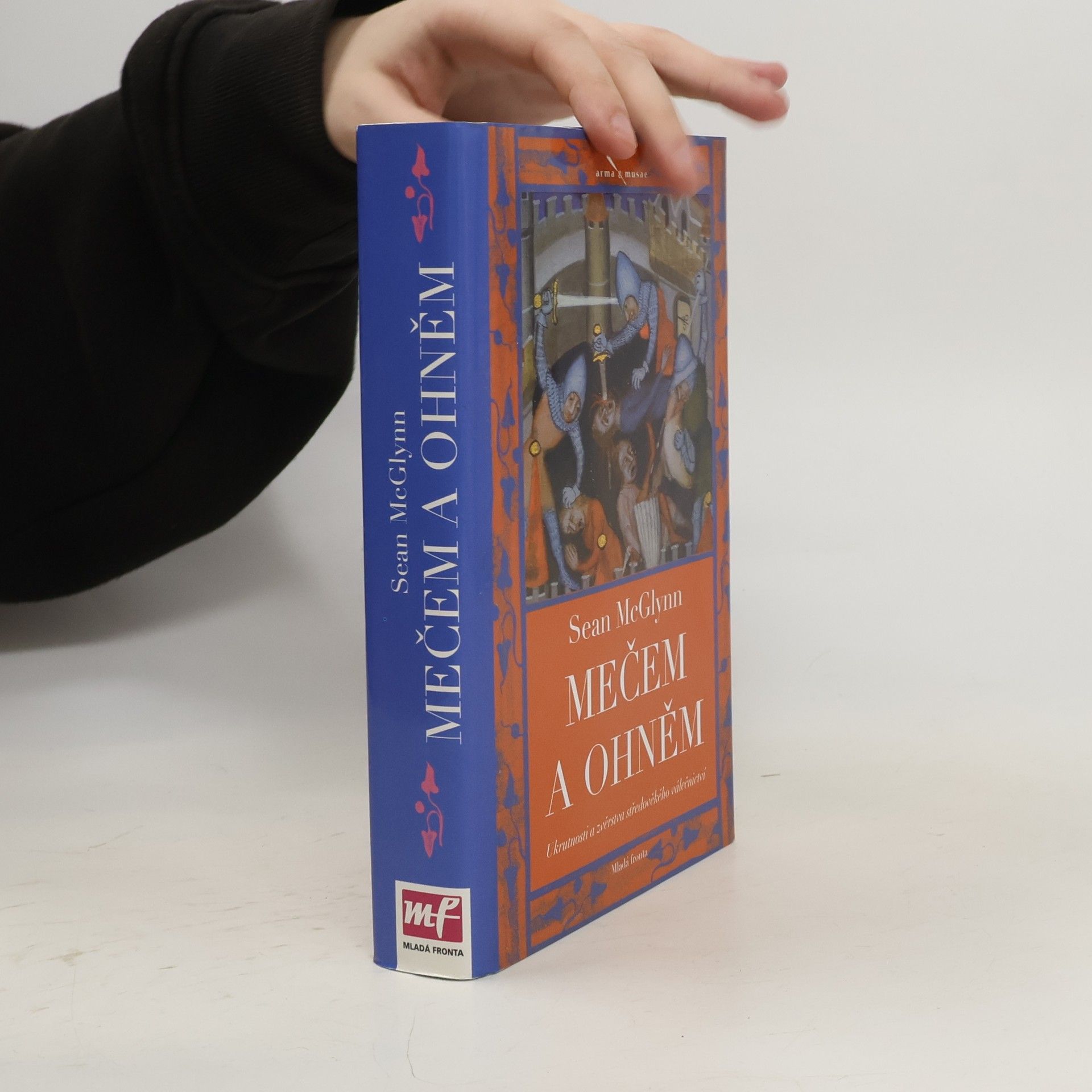 Sean McGlynn Mečem a ohněm: ukrutnosti a zvěrstva středověkého válečnictví