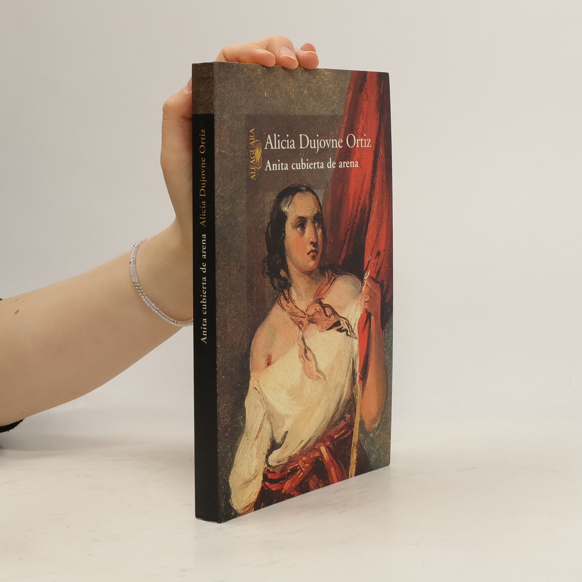 Anita cubierta de arena