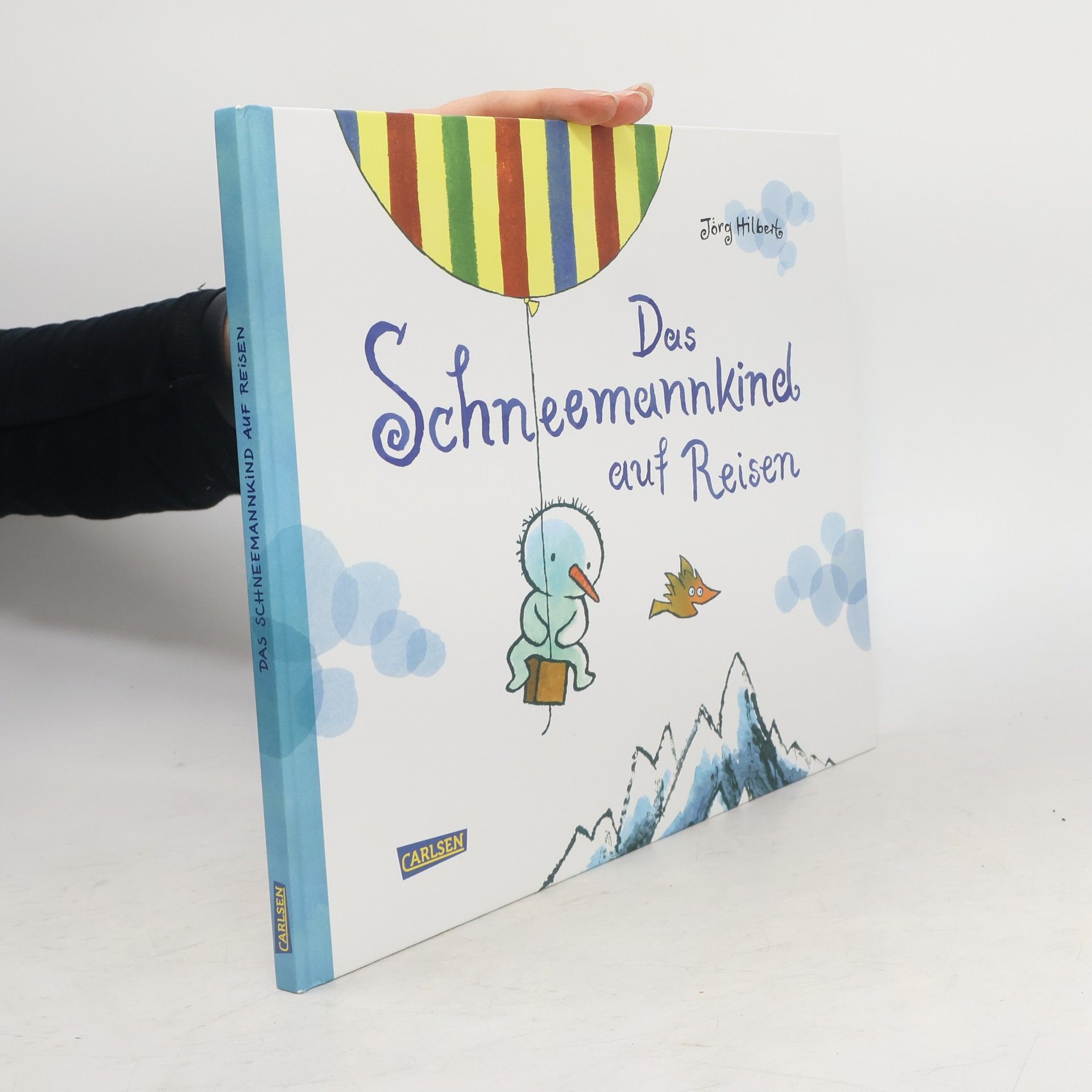 Jörg Hilbert Das Schneemannkind auf Reisen