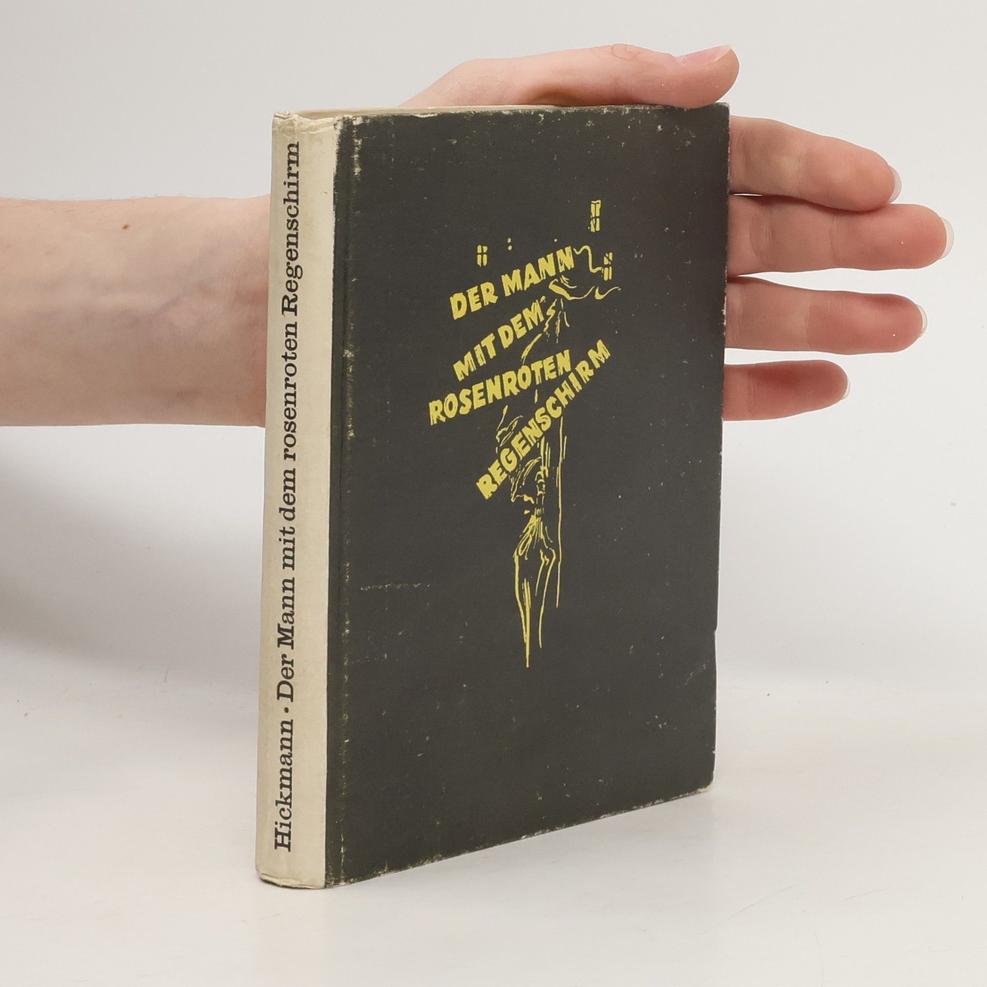 Der Mann mit dem rosenroten Regenschirm