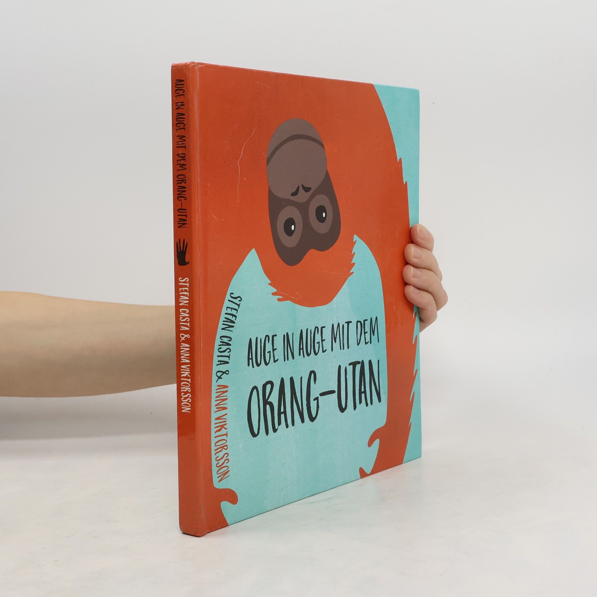 Stefan Casta Auge in Auge mit dem Orang-utan