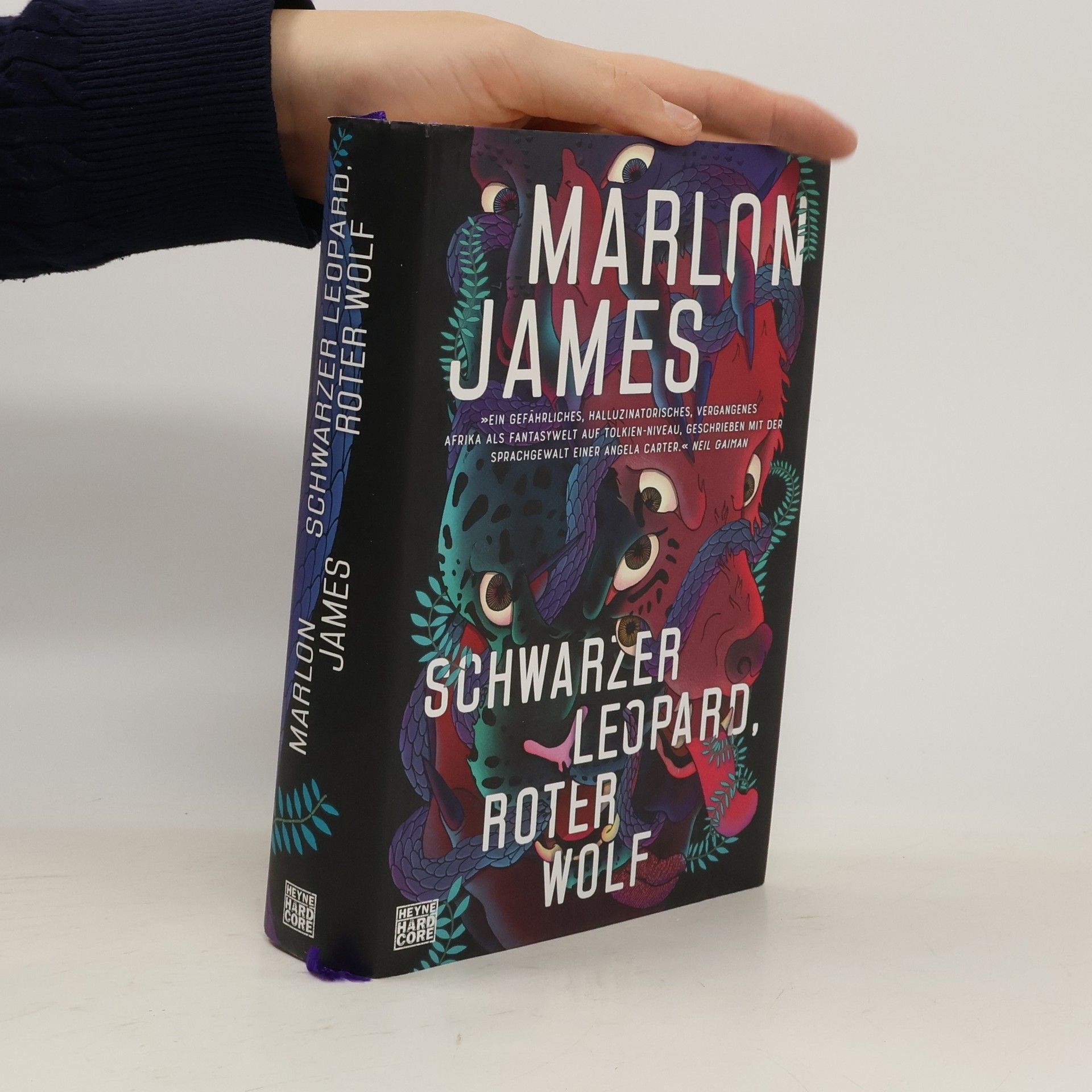 Schwarzer Leopard, roter Wolf