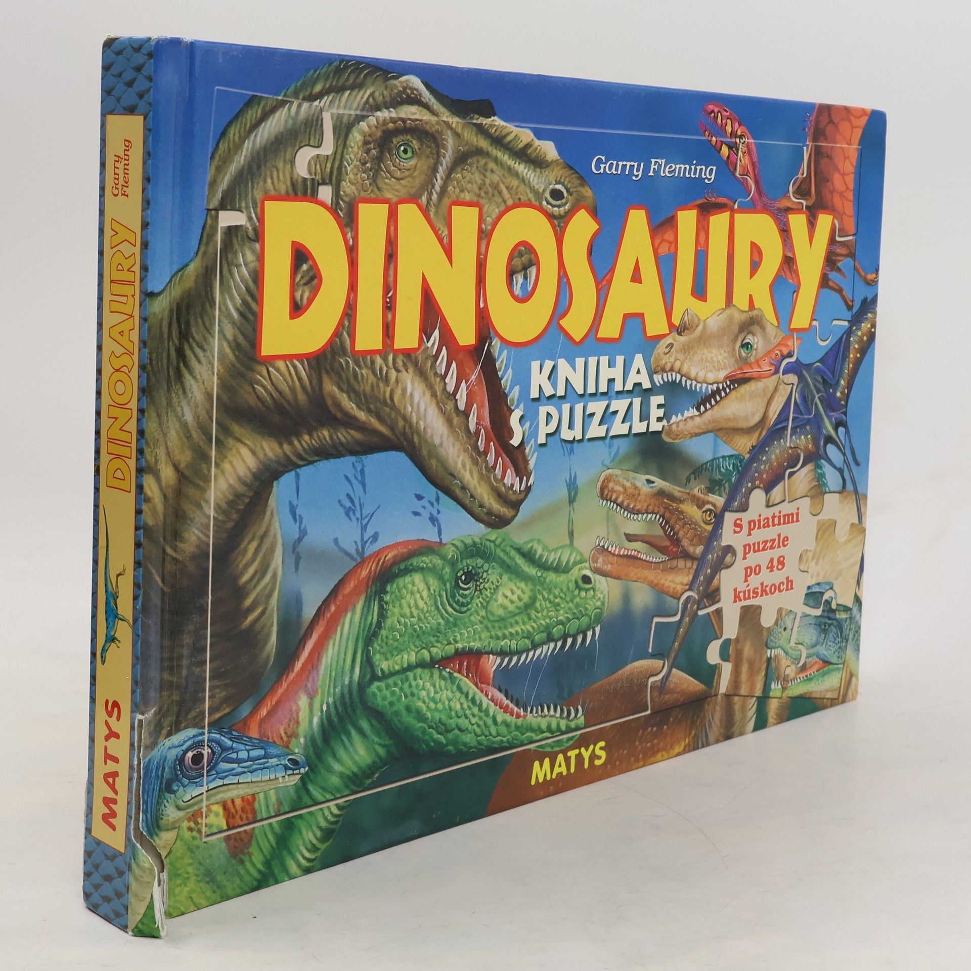 Garry Fleming Dinosaury - kniha s puzzle