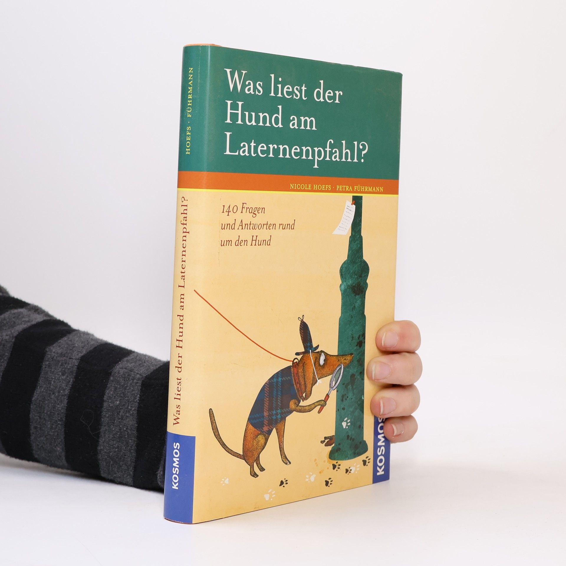 Was liest der Hund am Laternenpfahl?