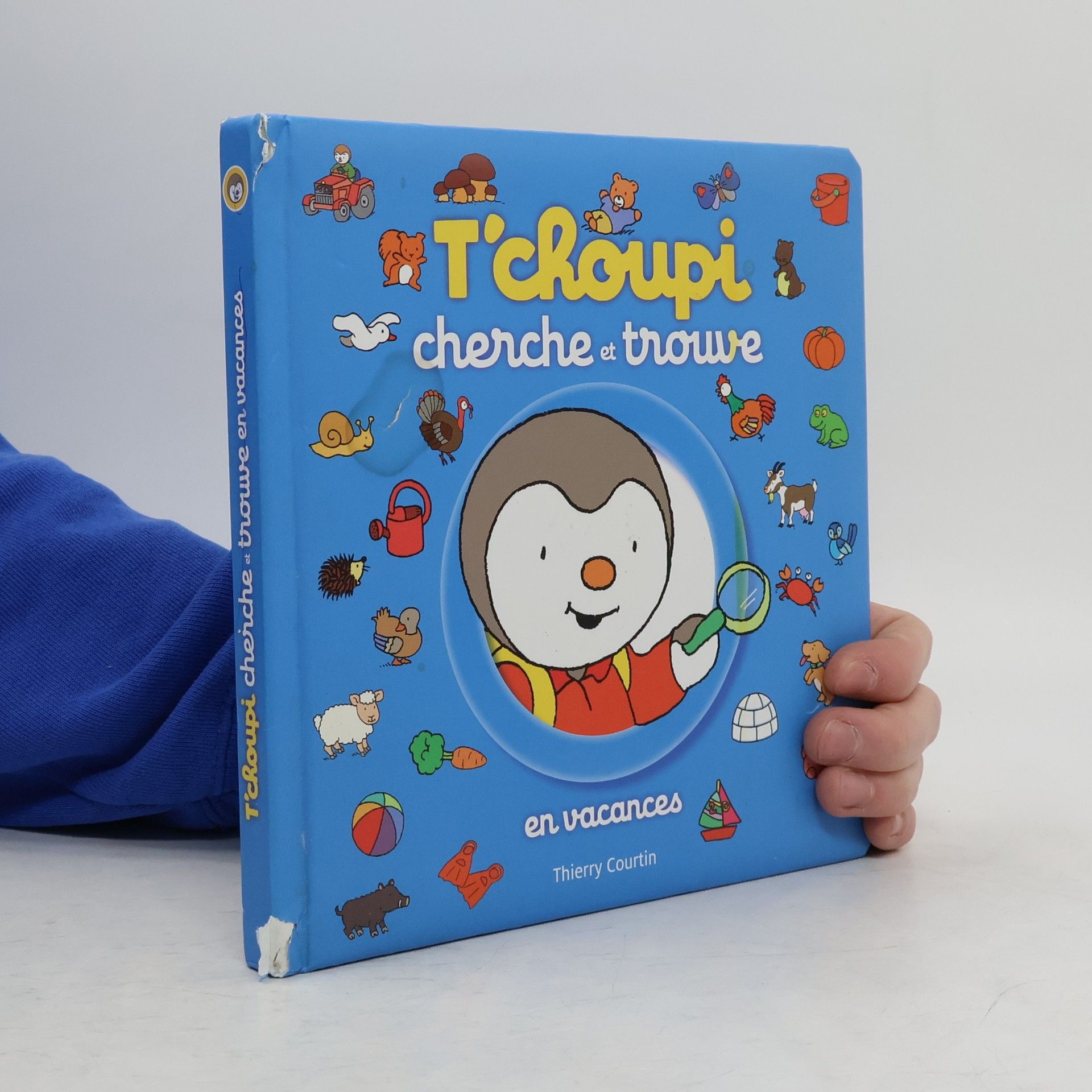 Thierry Courtin T'choupi cherche et trouve. En vacances