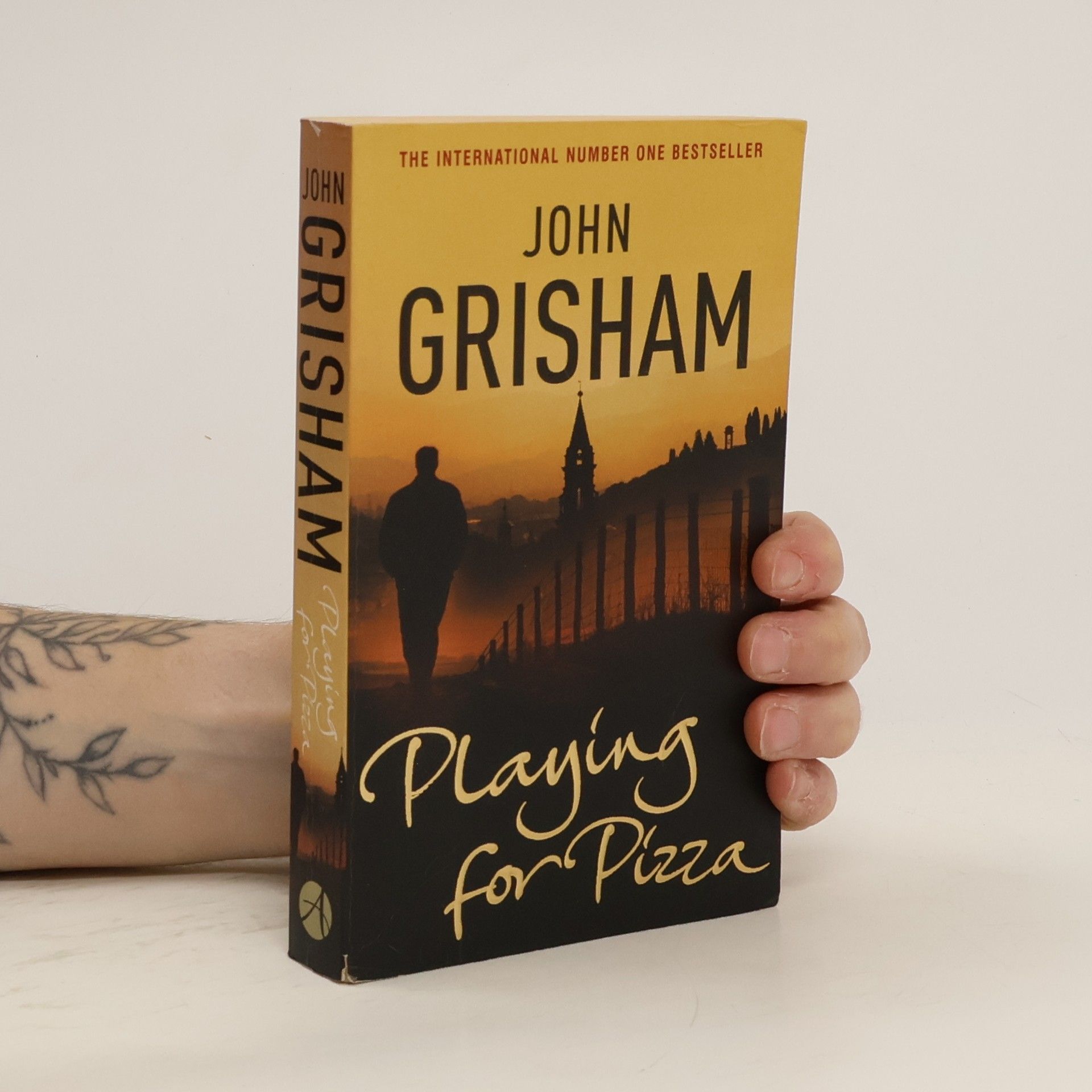 John Grisham Playing for pizza