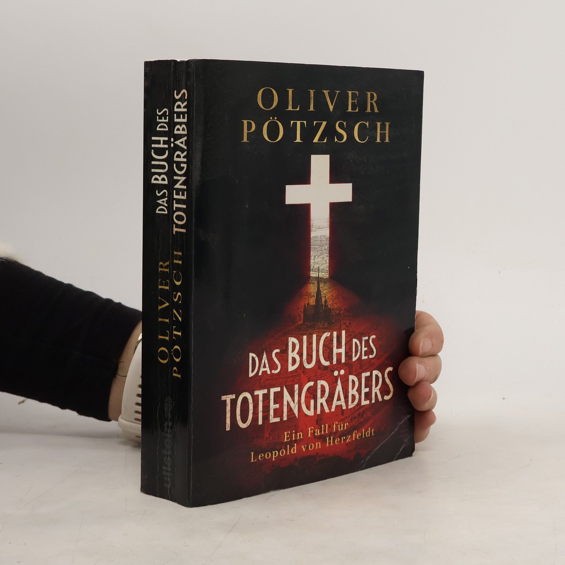 Das Buch des Totengräbers : ein Fall für Leopold von Herzfeldt