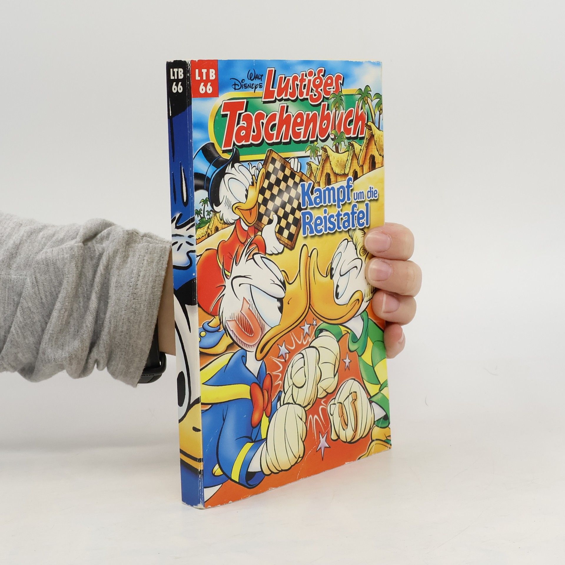 Walt Disney Lustiges Taschenbuch. Kampf um die Reistafel