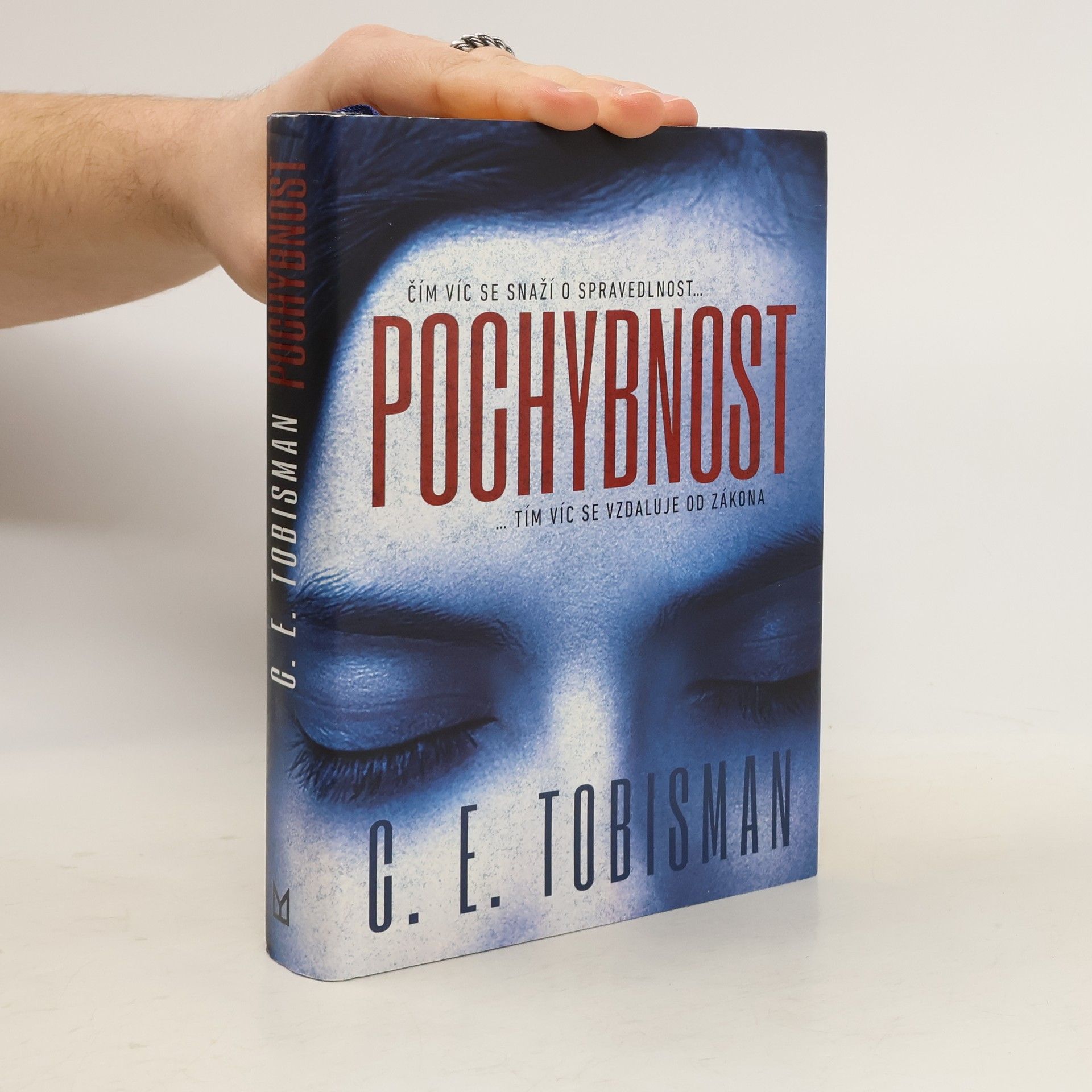 C. E. Tobisman Pochybnost