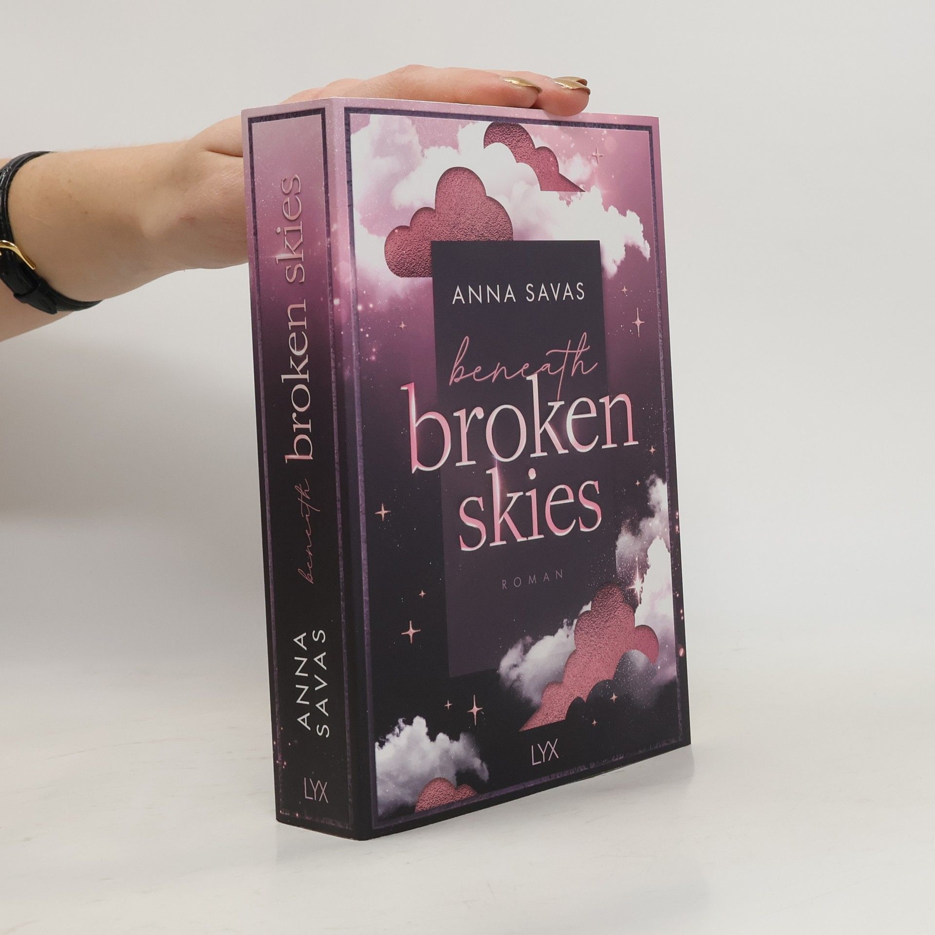 Anna Savas Beneath Broken Skies