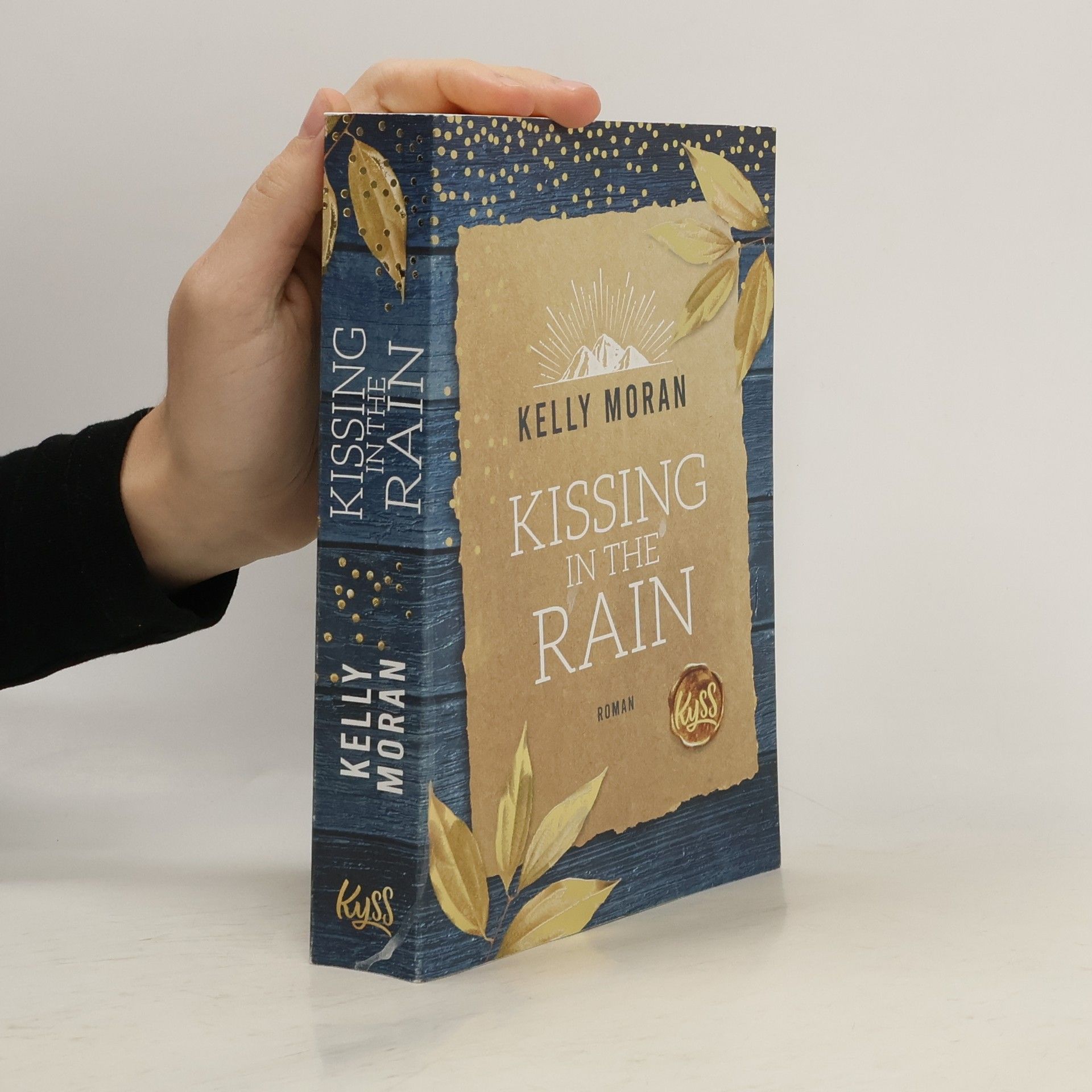 Kelly Moran Kissing in the Rain