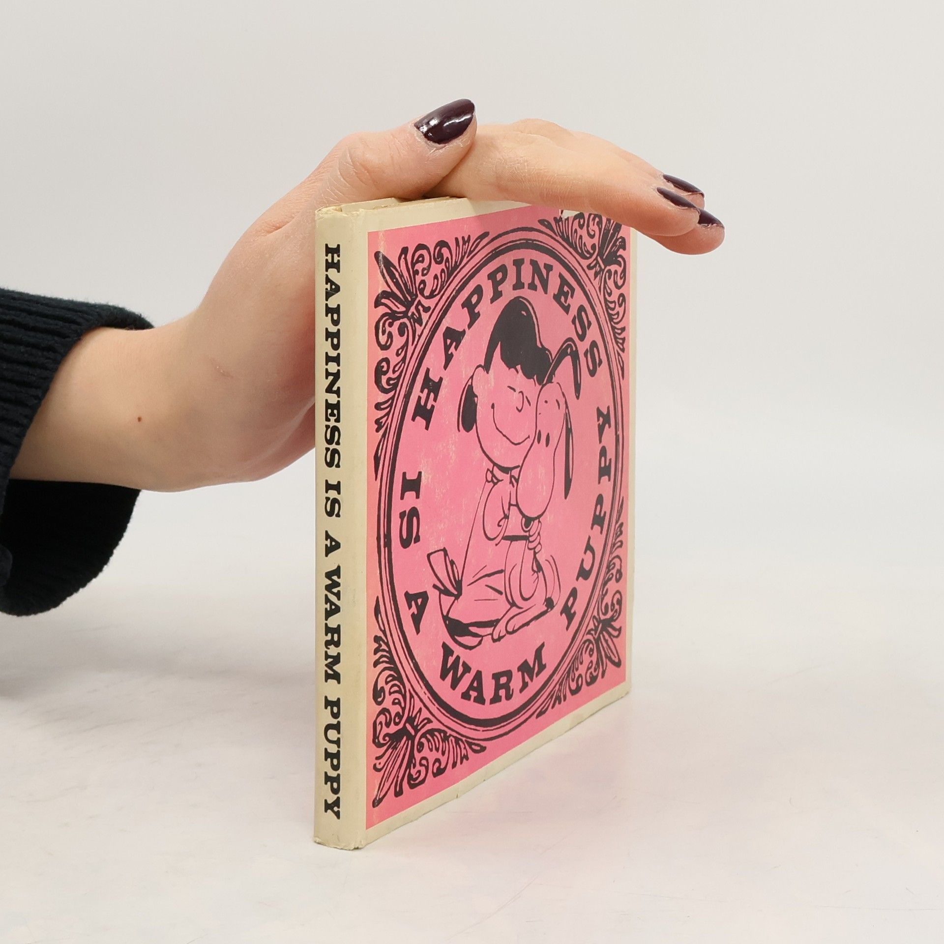 Charles Monroe Schulz Happiness is a Warm Puppy