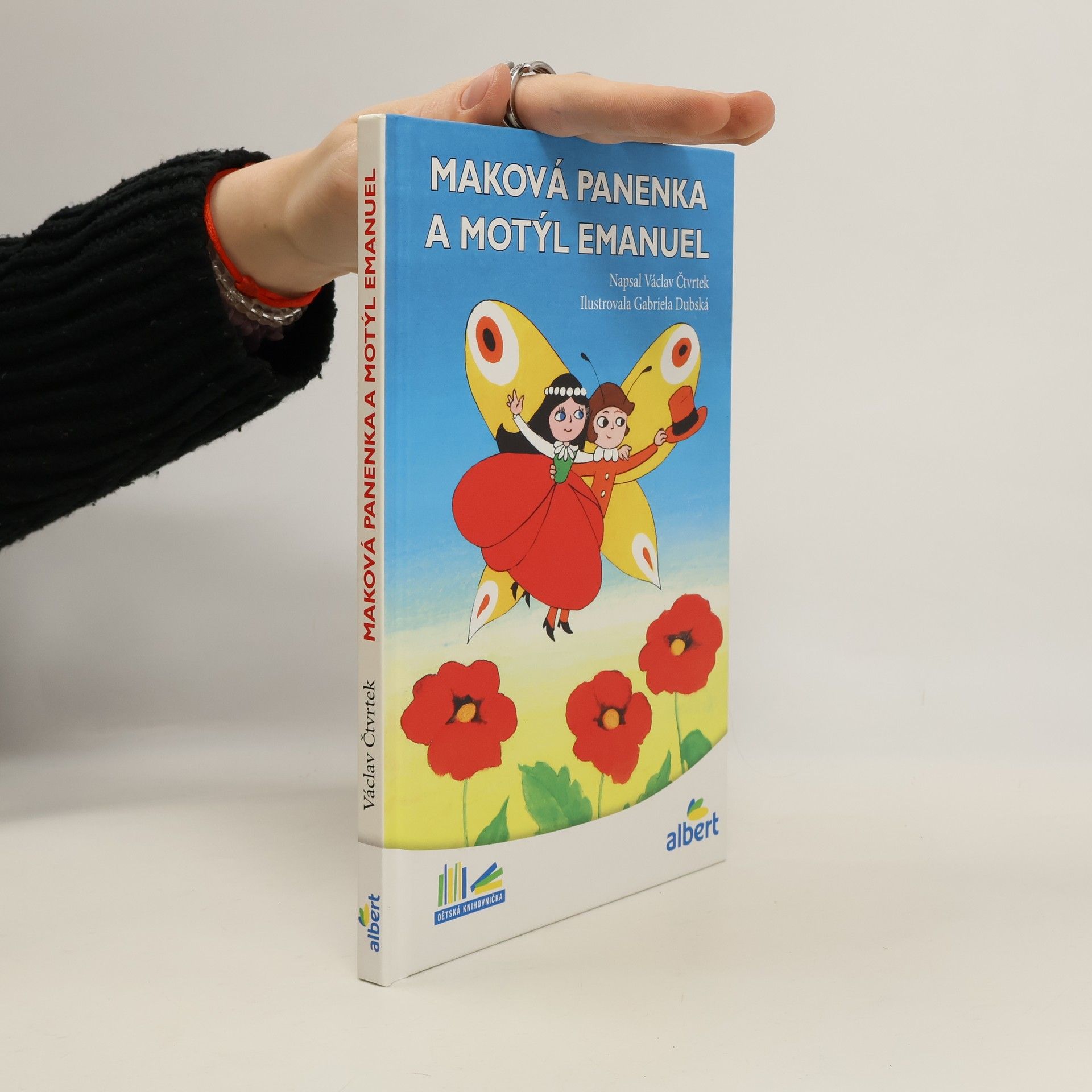 Maková panenka a motýl Emanuel